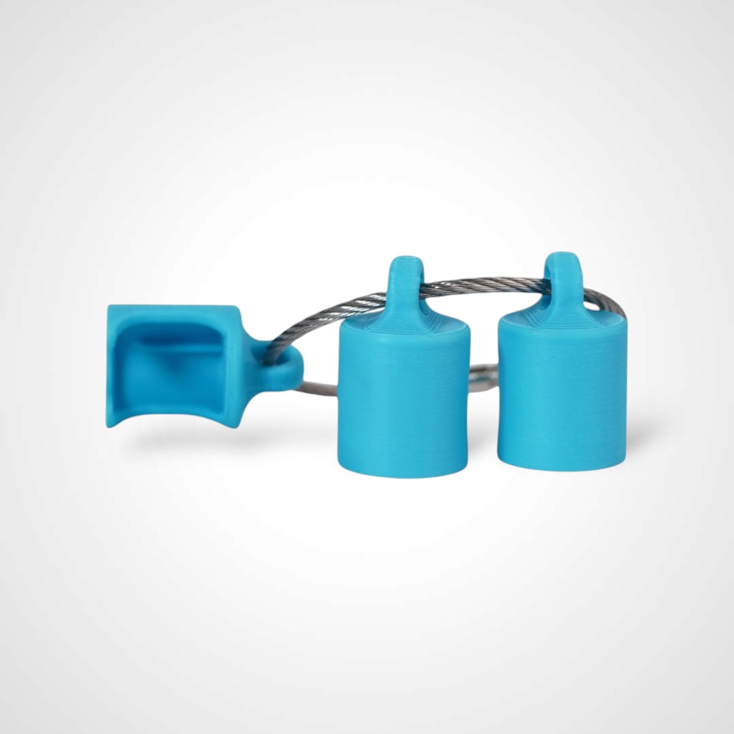 Three blue polylactic acid created using additive manufacturing classic cap clips on steel cable keyring. Shown on a white background.