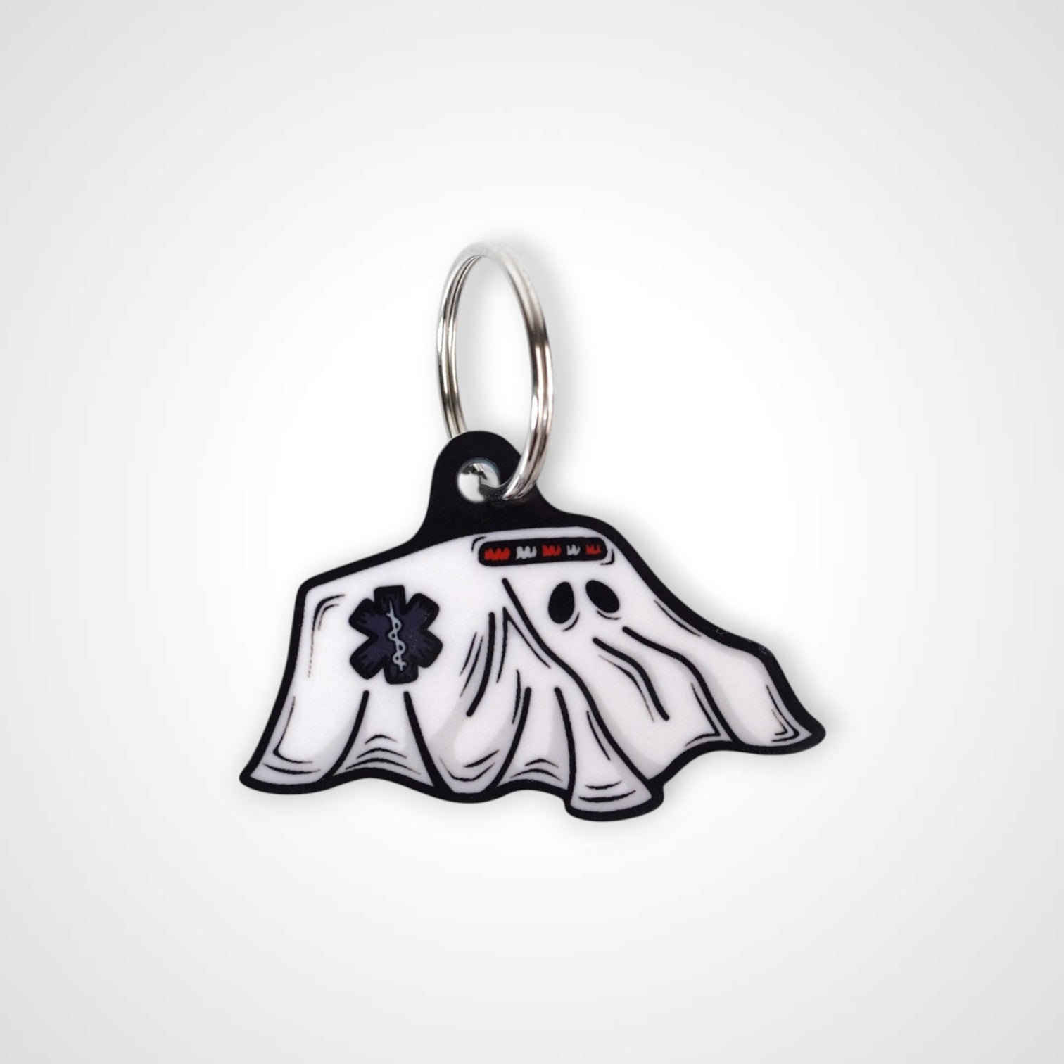 Boo boo bus cast acrylic keychain with double coil keyring. Shown on white background.