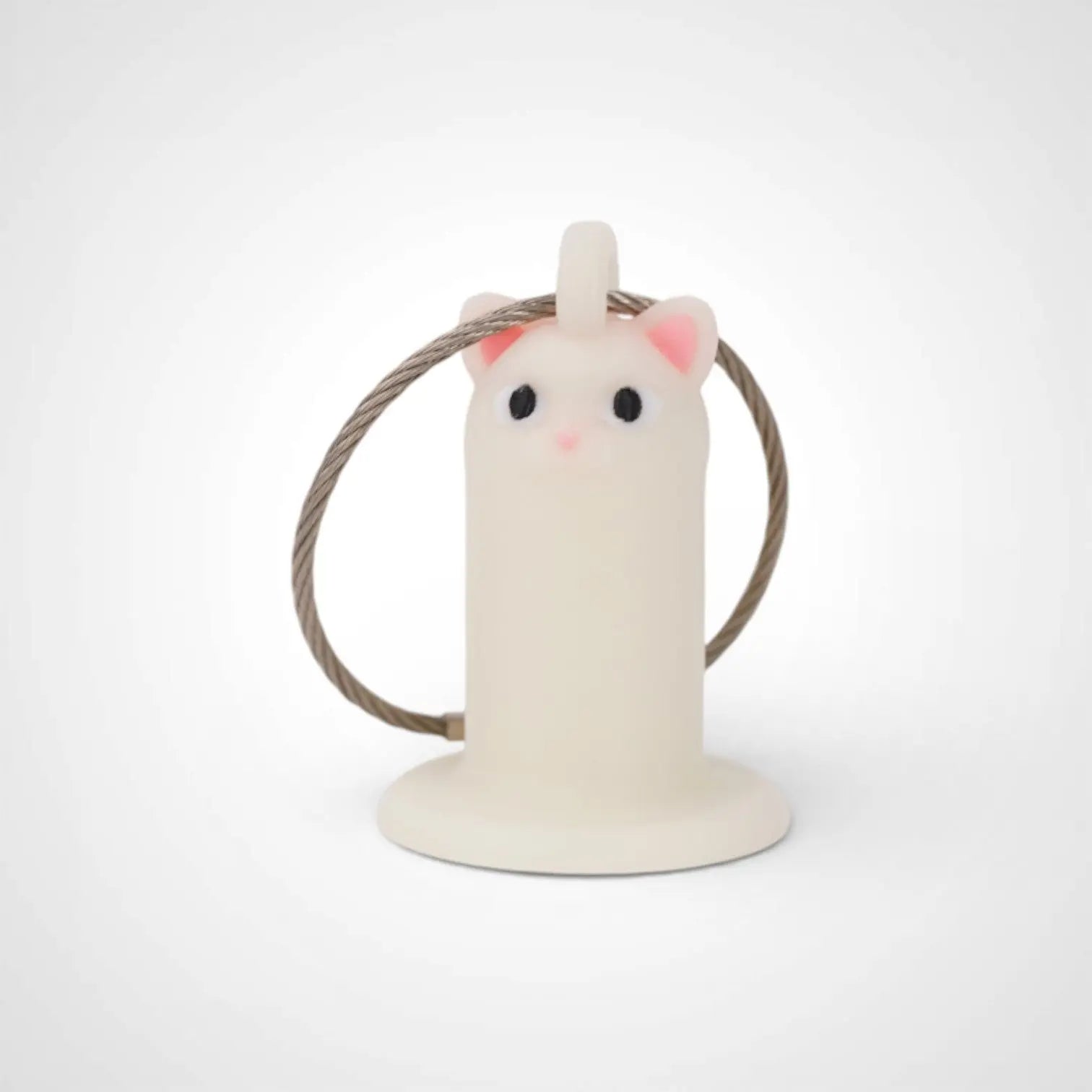 Cat White Glow 1-inch roll holder made with polylactic acid, created using additive manufacturing for holding tape and bandage rolls. With a steel cable keyring. Shown on white background.