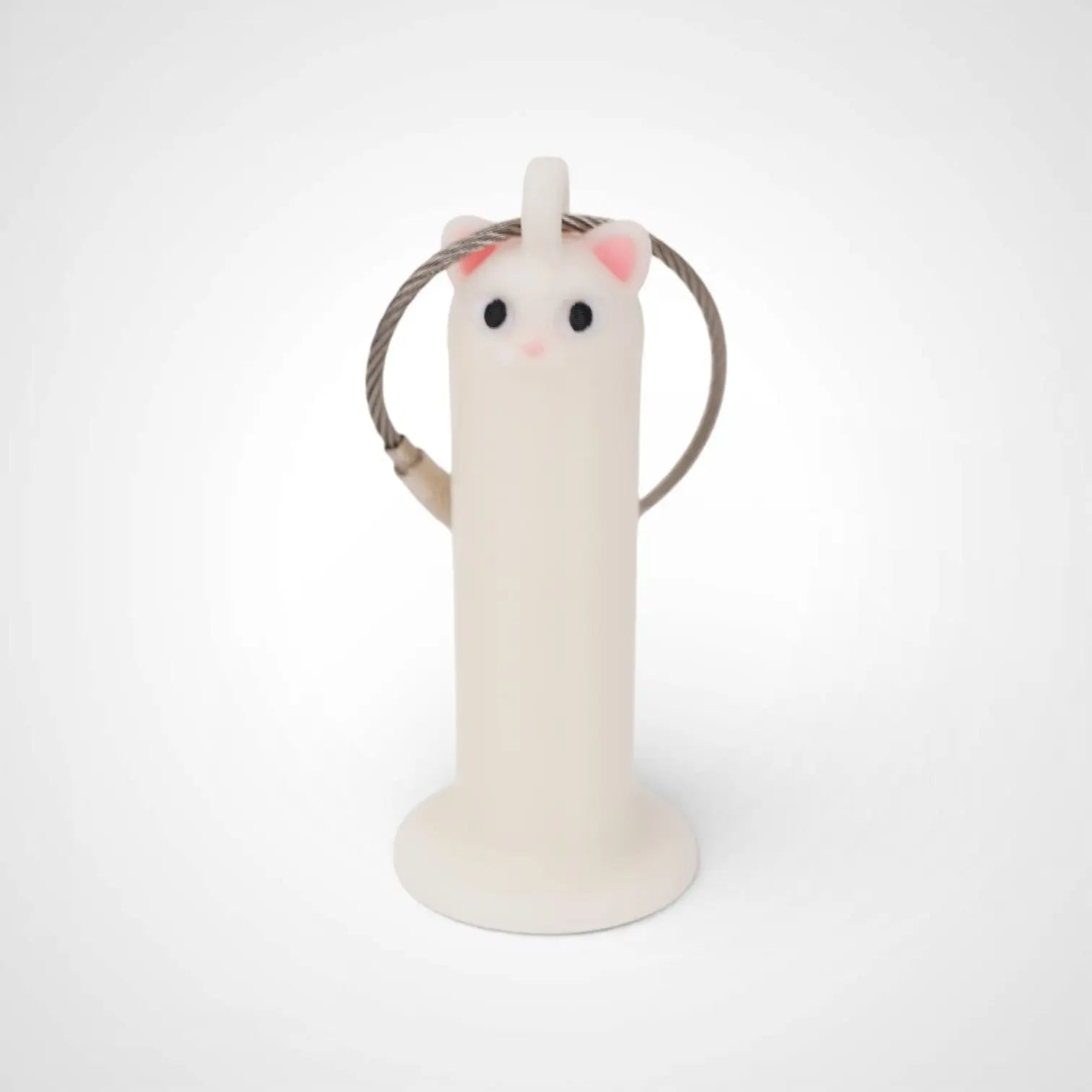 Cat White Glow 2-inch roll holder made with polylactic acid, created using additive manufacturing for holding tape and bandage rolls. With a steel cable keyring. Shown on white background.