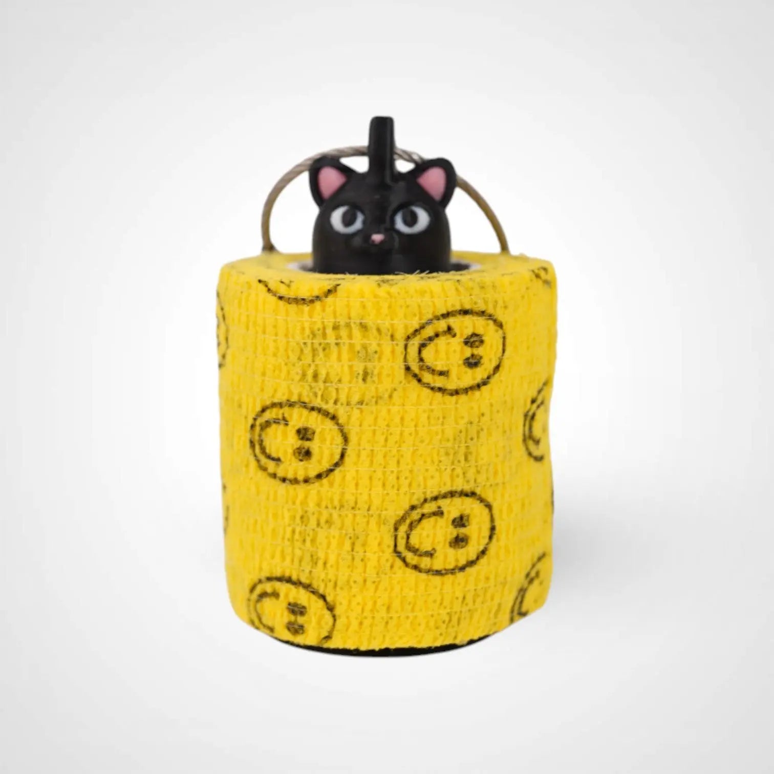 Cat Black 2-inch roll holder made with polylactic acid, created using additive manufacturing for holding tape and bandage rolls. With a steel cable keyring. Shown with tape on white background.