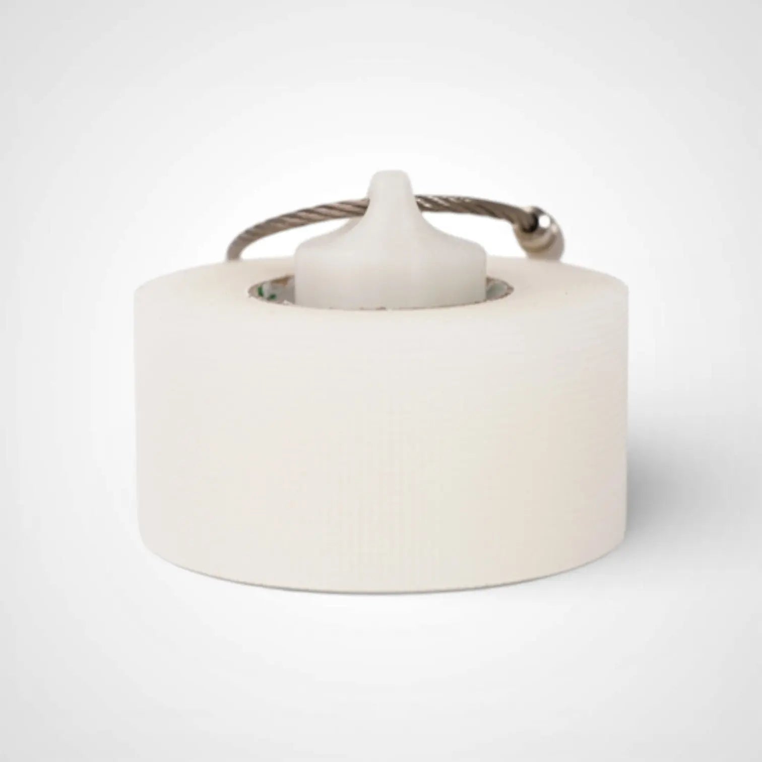 White glow blue 1-inch roll holder made with polylactic acid, created using additive manufacturing for holding tape and bandage rolls. With a steel cable keyring. Shown with tape on white background.