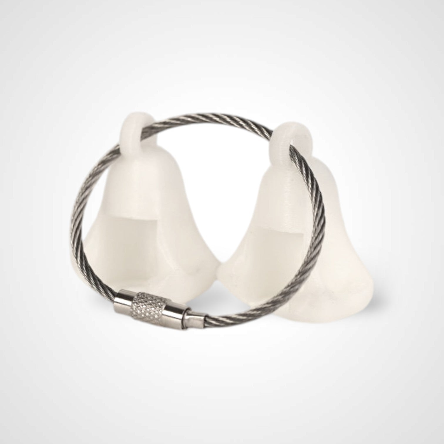Two white polylactic acid created using additive manufacturing ghost cap clips on steel cable keyring. Shown on a white background.