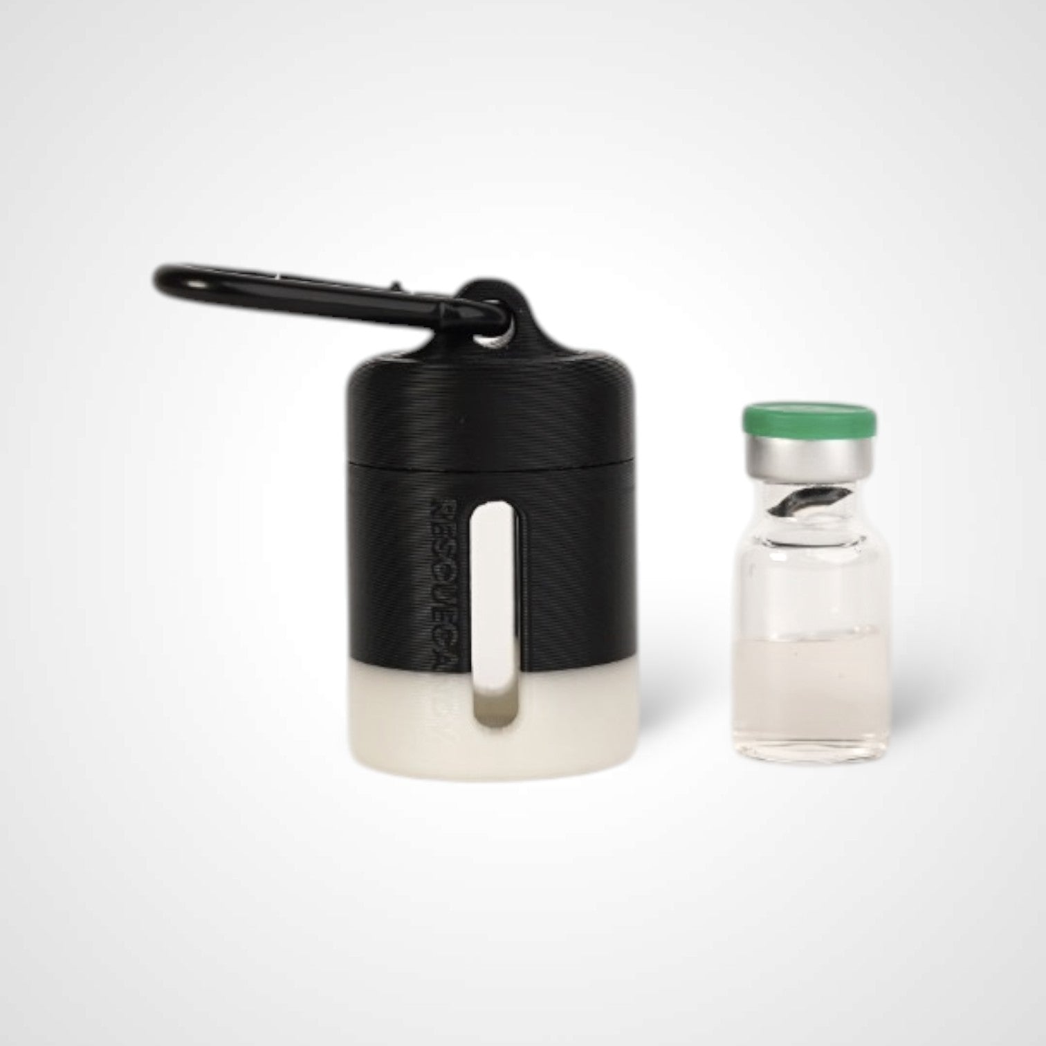 Black with white stripe vial vault. For empty 2ml or smaller vials, made with polylactic acid created using additive manufacturing. With 1.37" stainless steel black coated carabiner. Shown next to vial on white background.