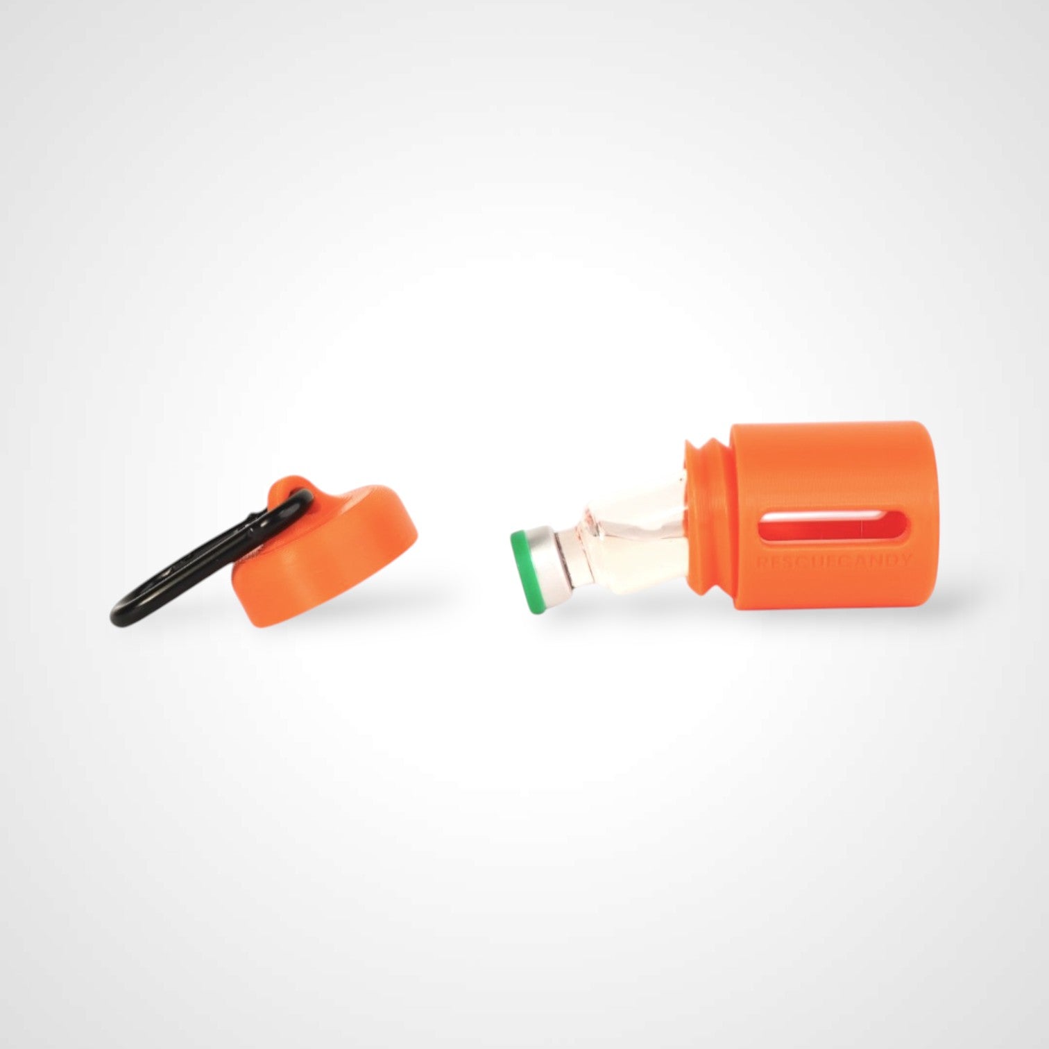 Rescue orange vial vault. For empty 2ml or smaller vials, made with polylactic acid created using additive manufacturing. With 1.37" stainless steel black coated carabiner. Shown with vial in it on white background.