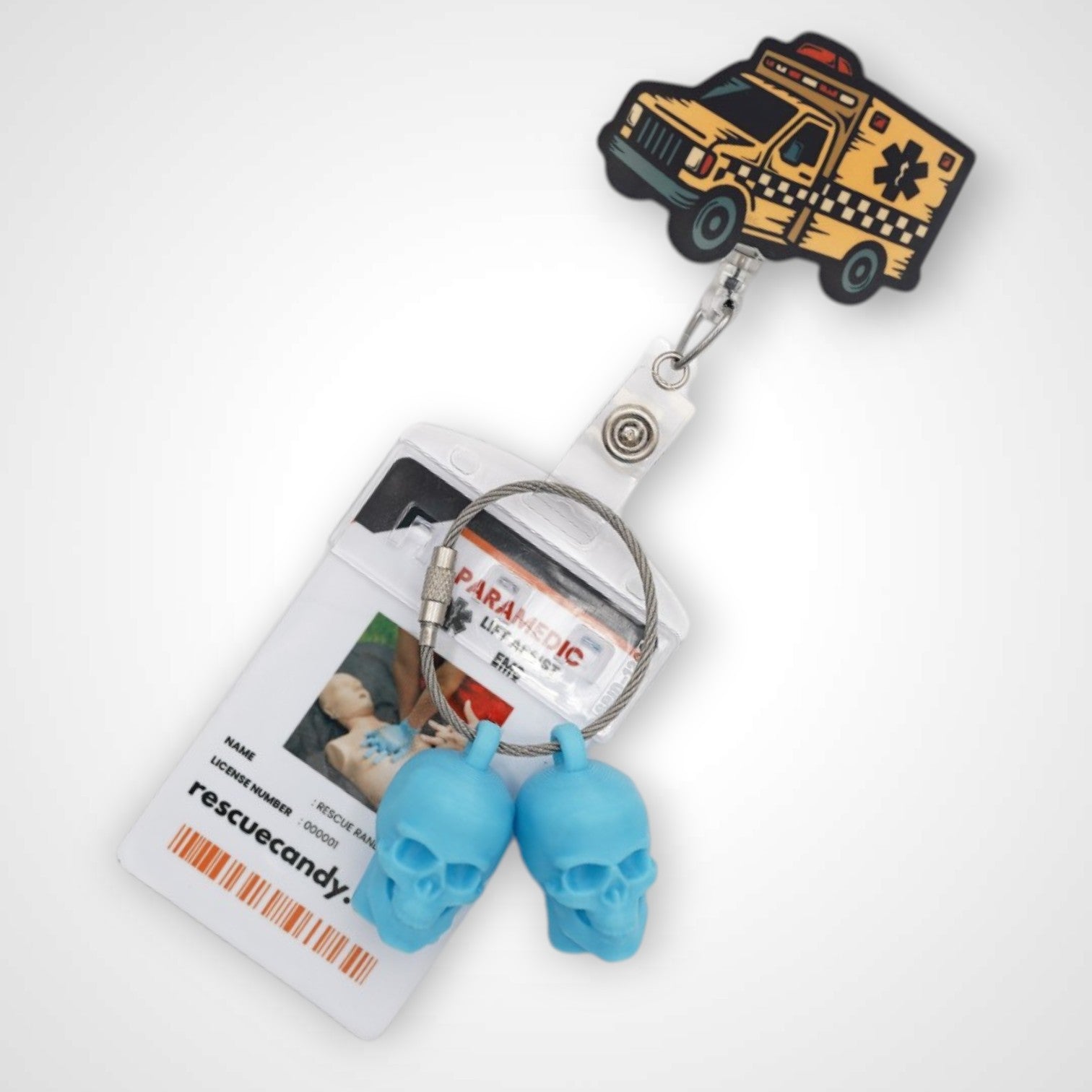 Taxi badge reel. On a swivel-alligator clip that rotates 360° with a nylon retractable string. Shown on a white background.