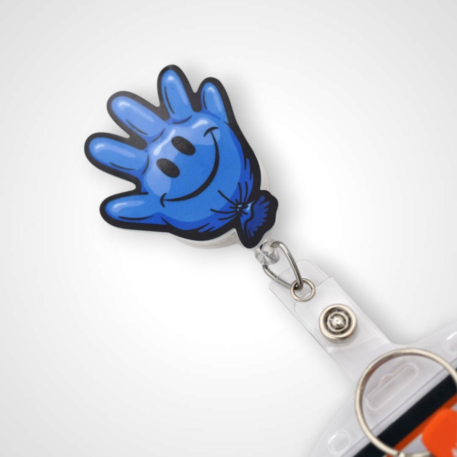 Blue Happy Glove badge reel. On a swivel-alligator clip that rotates 360° with a nylon retractable string. Shown on a white background.