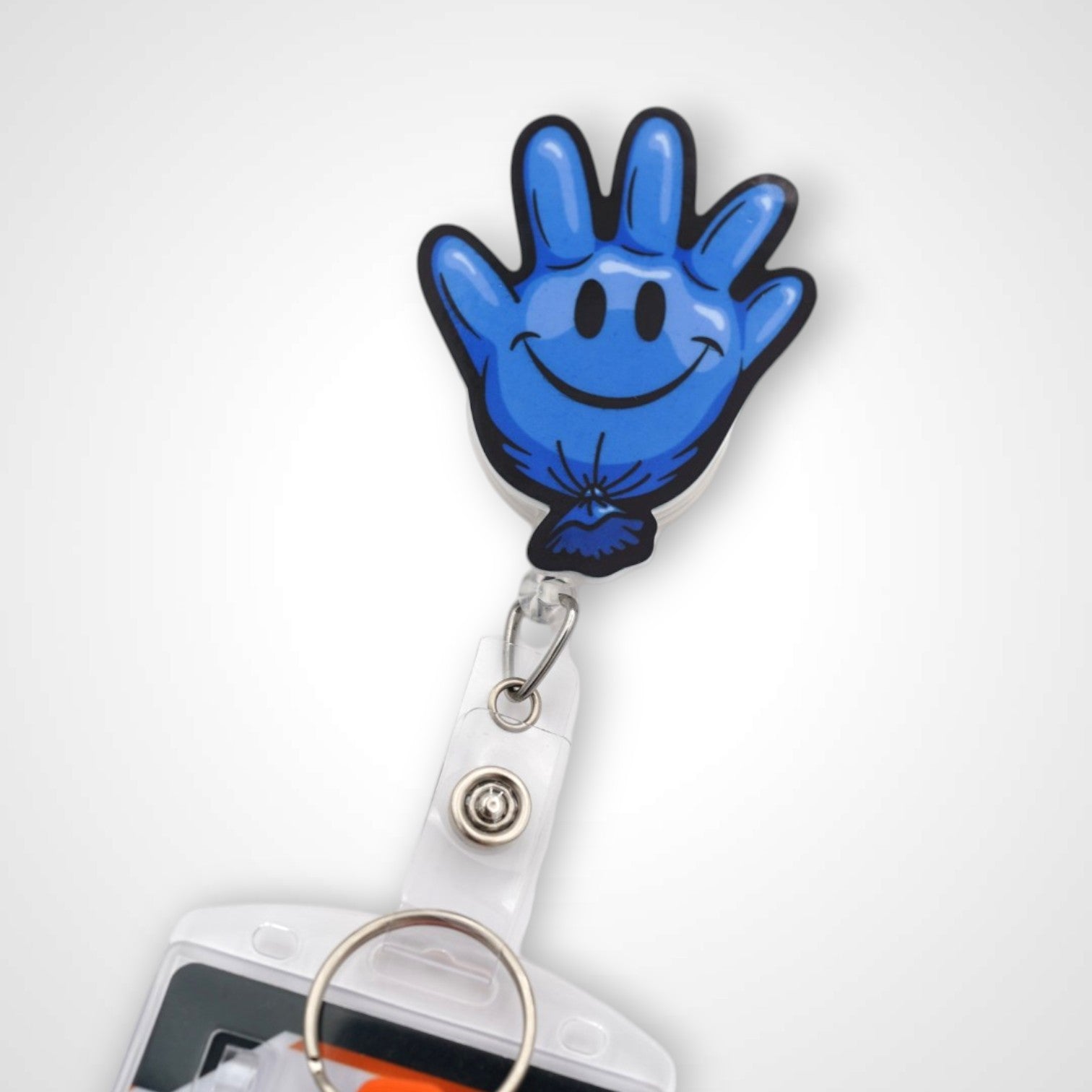 Blue Happy Glove badge reel. On a swivel-alligator clip that rotates 360° with a nylon retractable string. Shown on a white background.