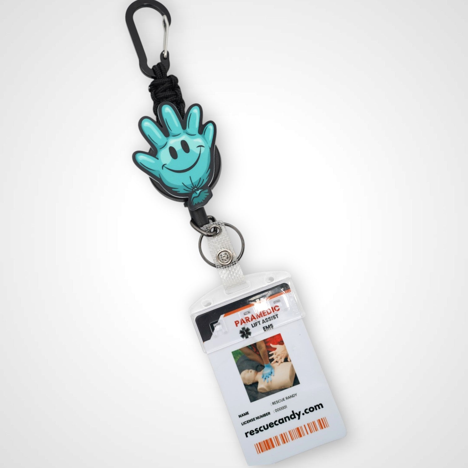 Teal Happy Glove badge reel. On a carabiner with a steel retractable cable. Shown on a white background.