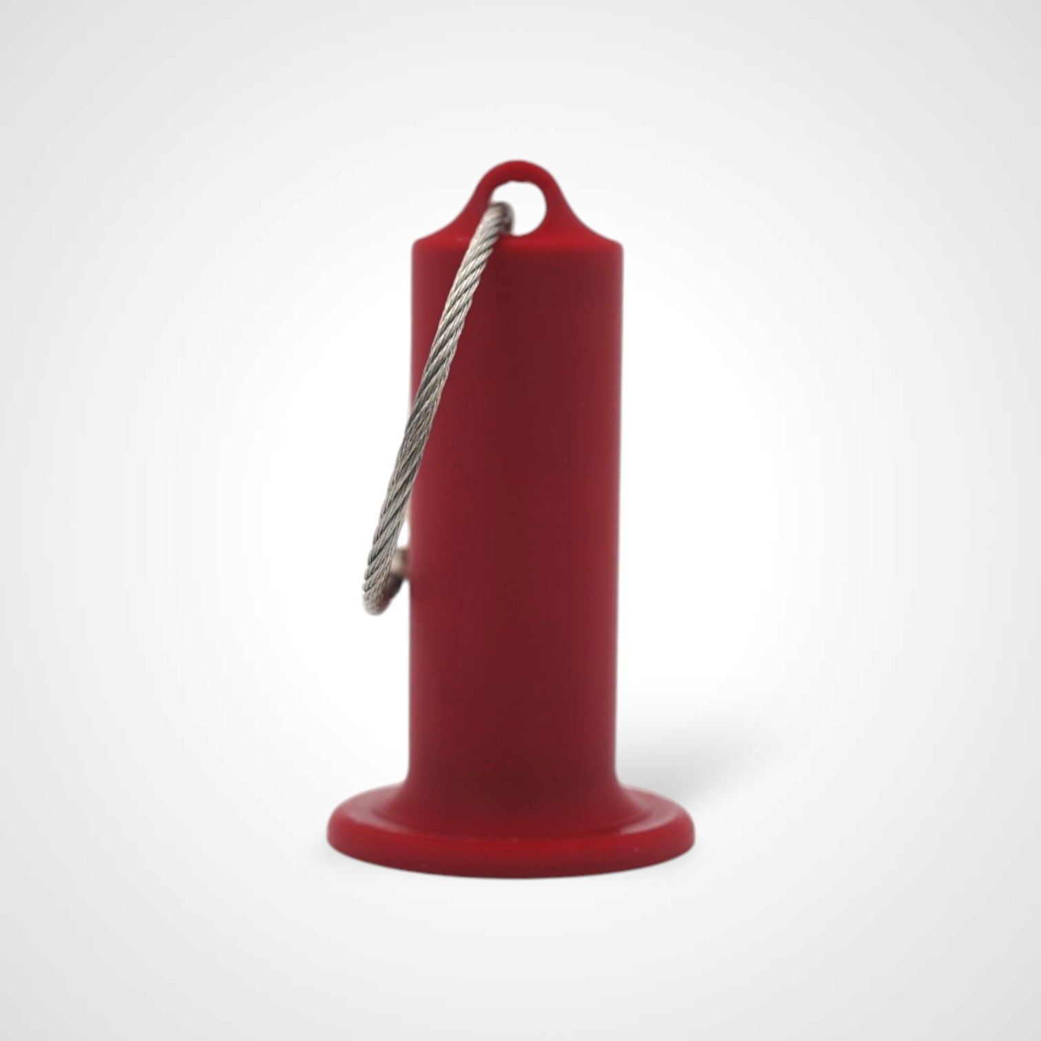 Red 2-inch roll holder made with polylactic acid, created using additive manufacturing for holding tape and bandage rolls. With a steel cable keyring. Shown on white background.