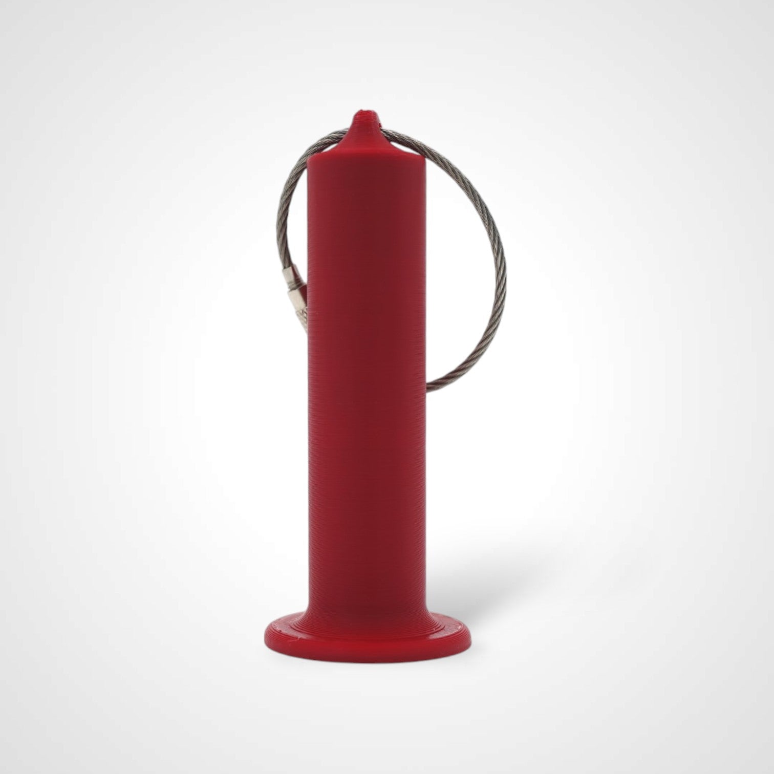 Red 3-inch roll holder made with polylactic acid, created using additive manufacturing for holding tape and bandage rolls. With a steel cable keyring. Shown on white background.