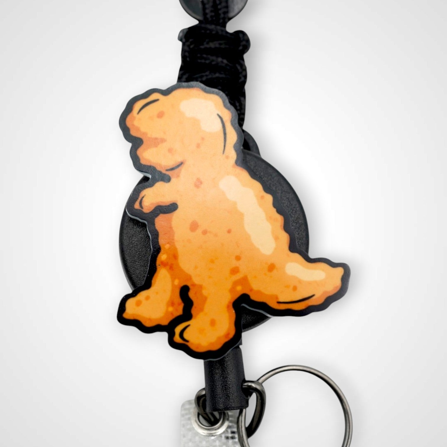 T-Rex Chicken Nugget Badge Reel