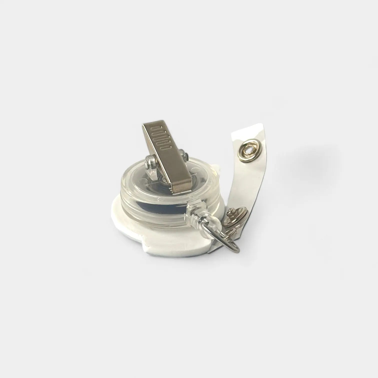 IO Drill badge reel. On a swivel-alligator clip that rotates 360° with a nylon retractable string. Shown on a white background.