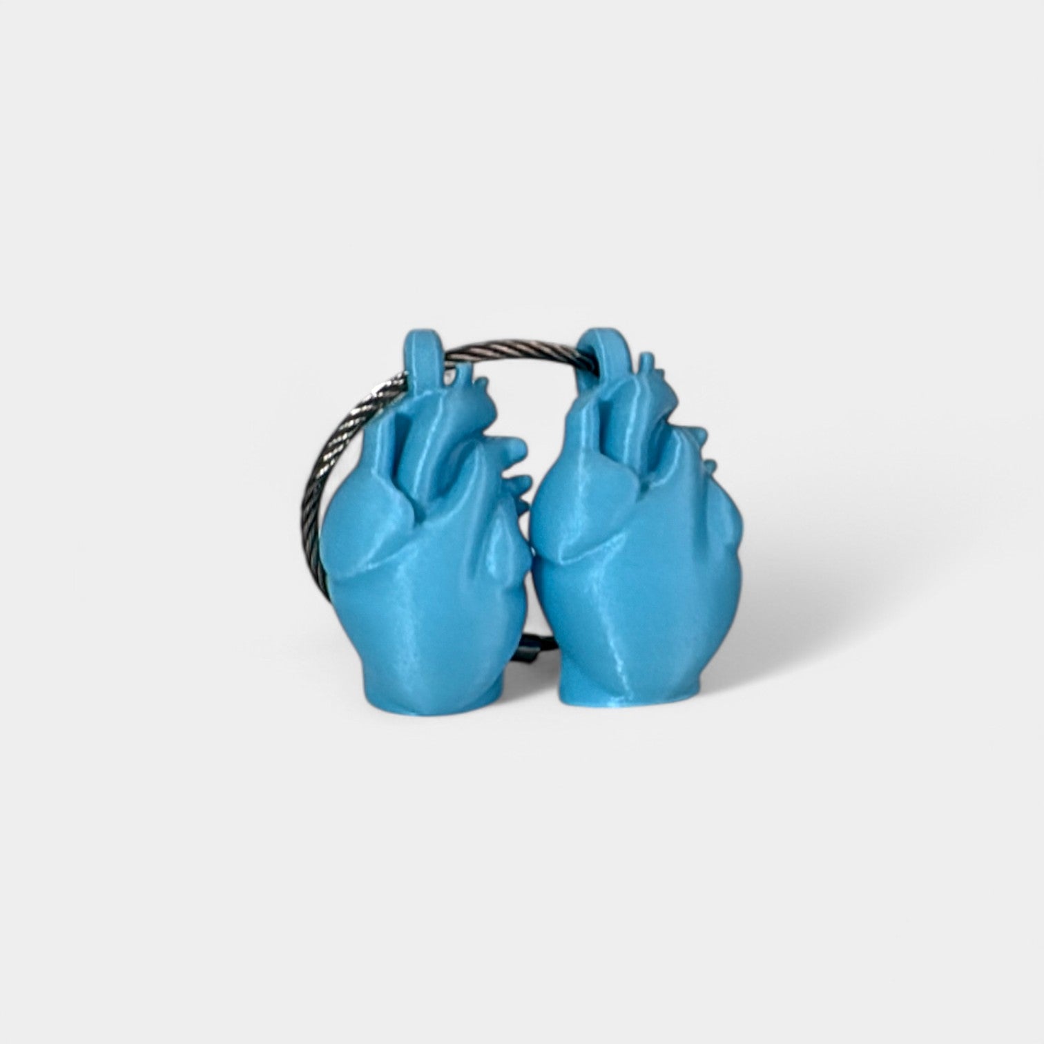 Blue Glow Teal Anatomical Heart Cap Clip 2-pack