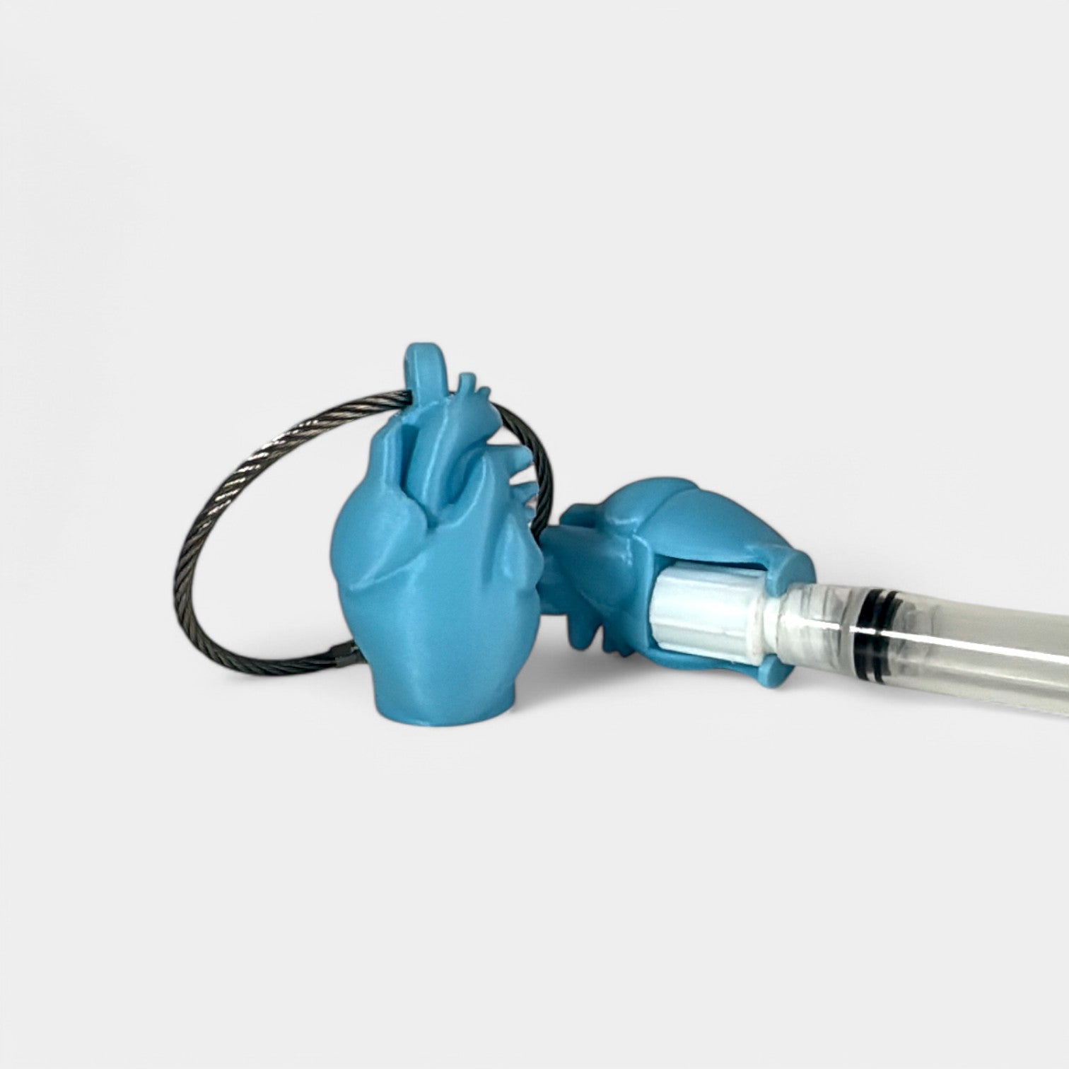 Blue Glow Teal Anatomical Heart Cap Clip 2-pack