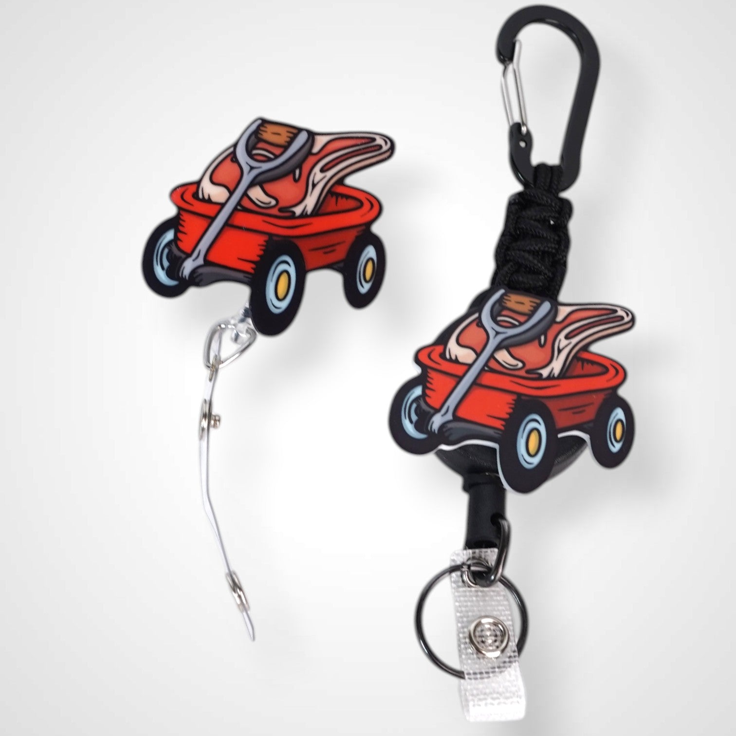 Meat wagon badge reel. On a carabiner with a steel retractable cable next to a swivel-alligator clip that rotates 360° with a nylon retractable string. Shown on a white background.