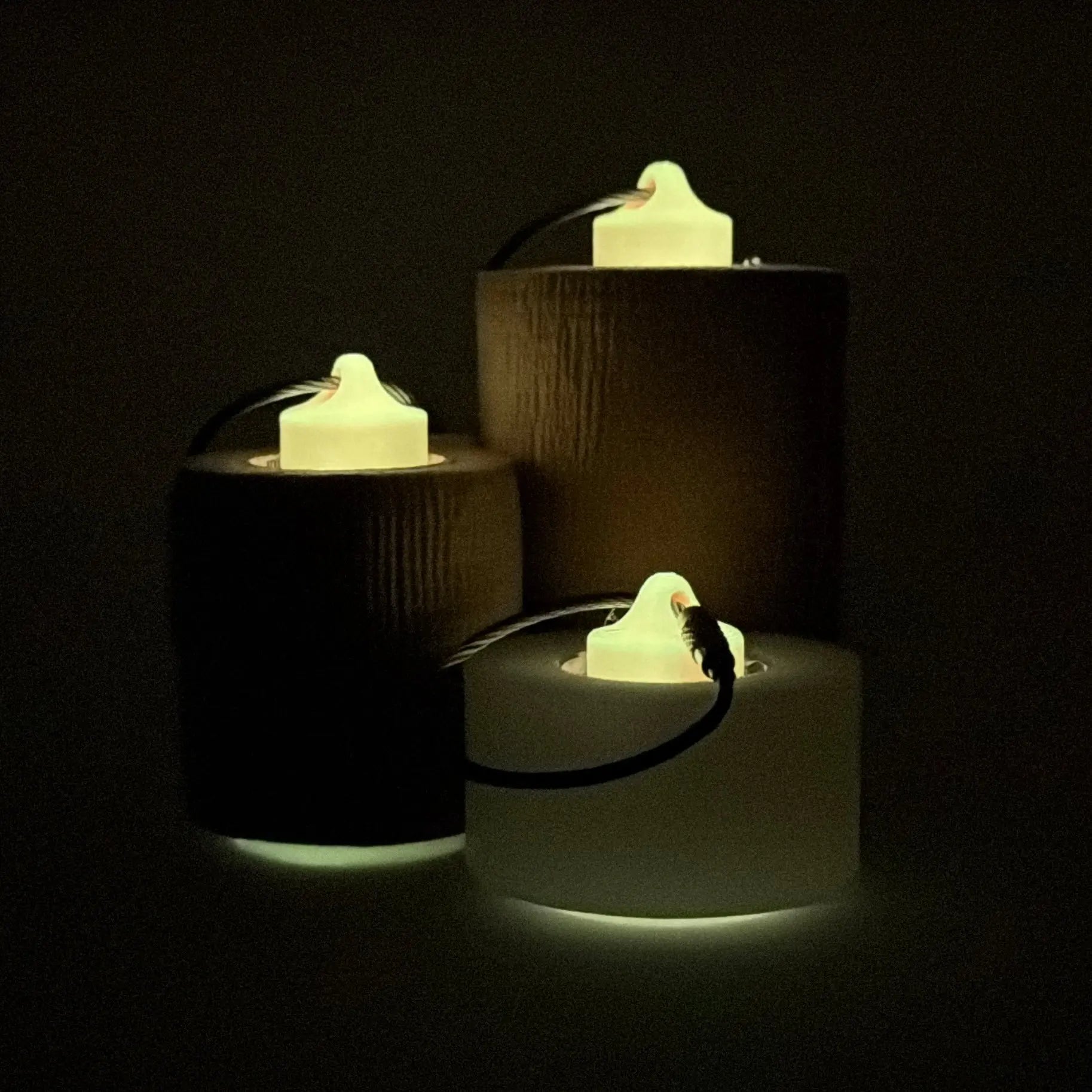 a compact orange glow yellow roll holder to hold and tape and coban for EMS, paramedics, EMT's, nurses, flightmed, vetmed, and athletic trainers