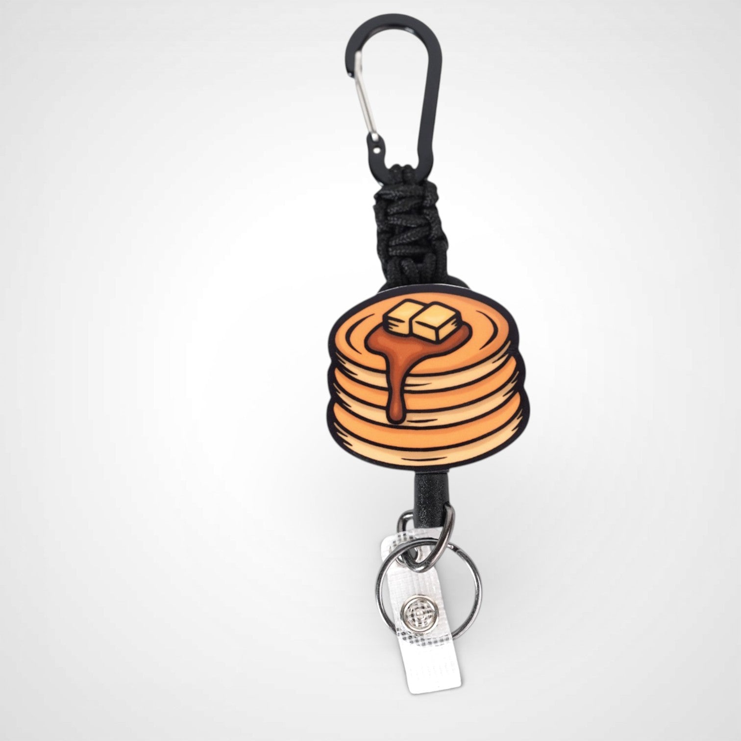 Pancake badge reel. On a carabiner with a steel retractable cable. Shown on a white background.