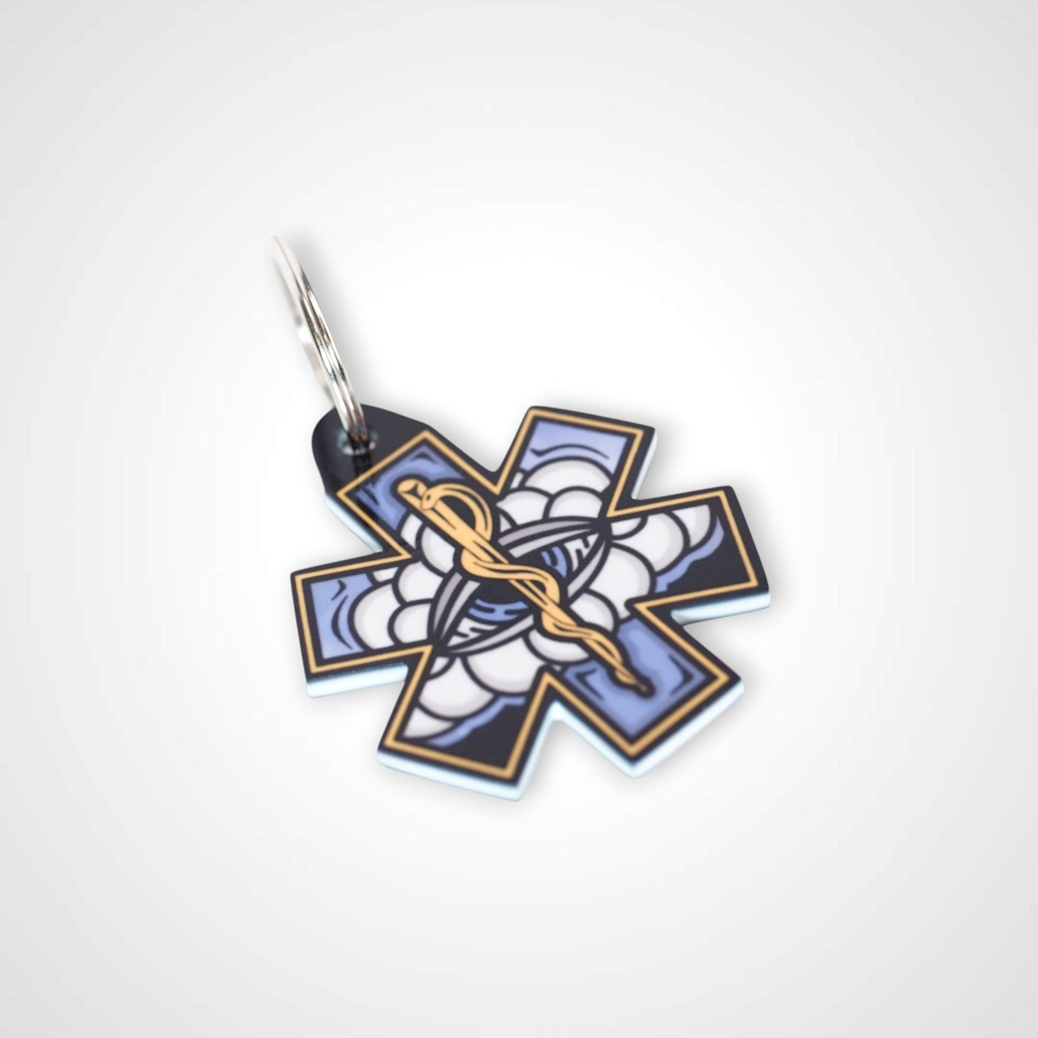White Cloud cast acrylic keychain with double coil keyring. Shown on white background.