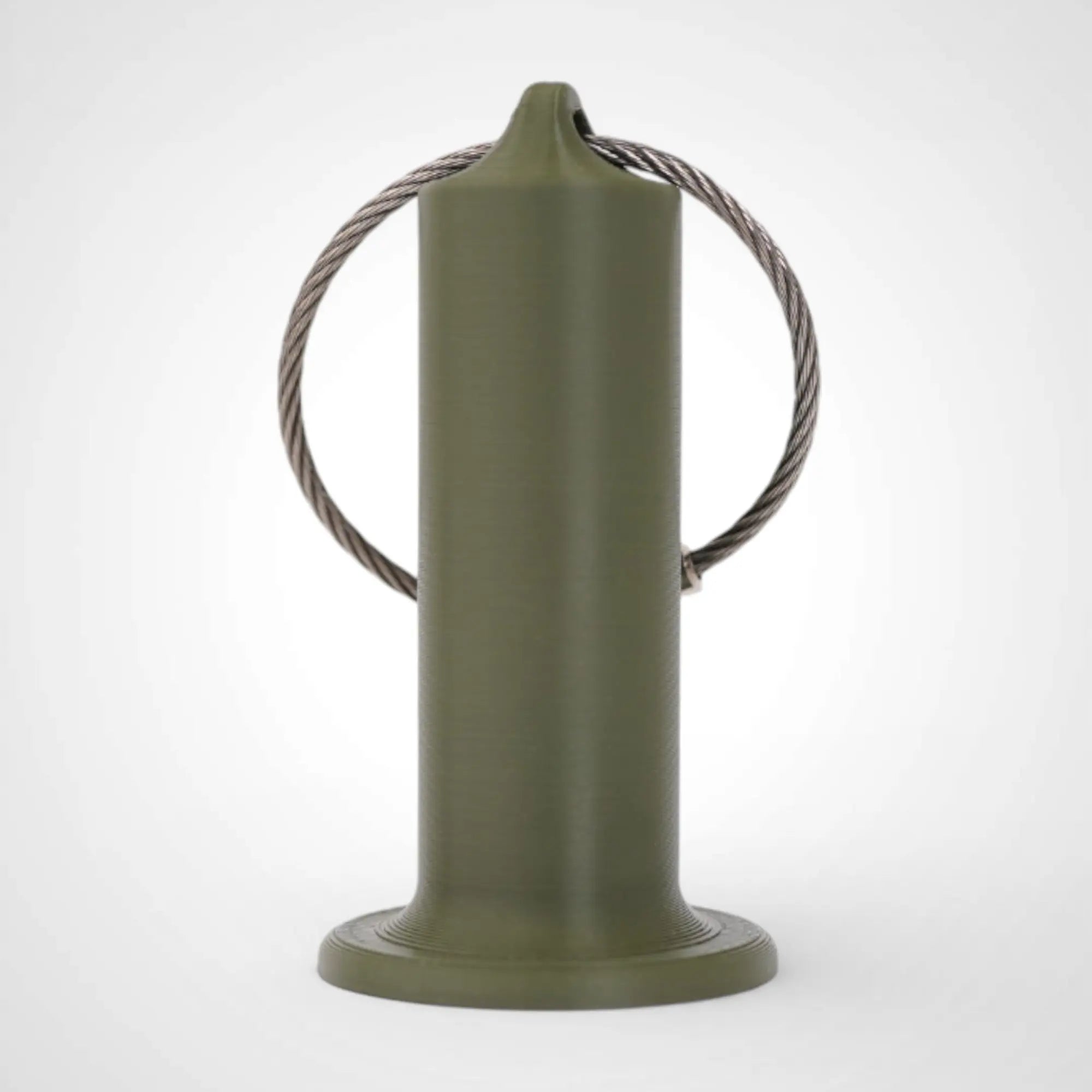 Army Green 2-inch roll holder made with polylactic acid, created using additive manufacturing for holding tape and bandage rolls. With a steel cable keyring. Shown on white background.