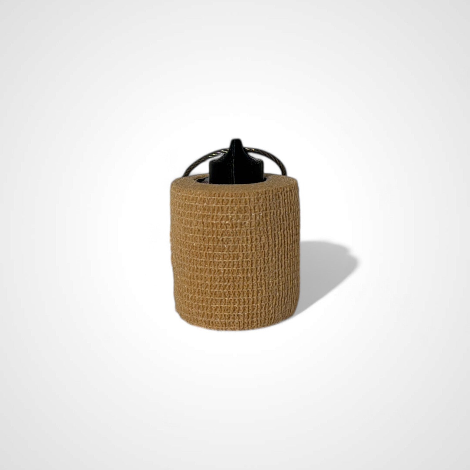 a compact black roll holder 2 inches tall to hold and tape and coban for EMS, paramedics, EMT's, nurses, flightmed, vetmed, and athletic trainers