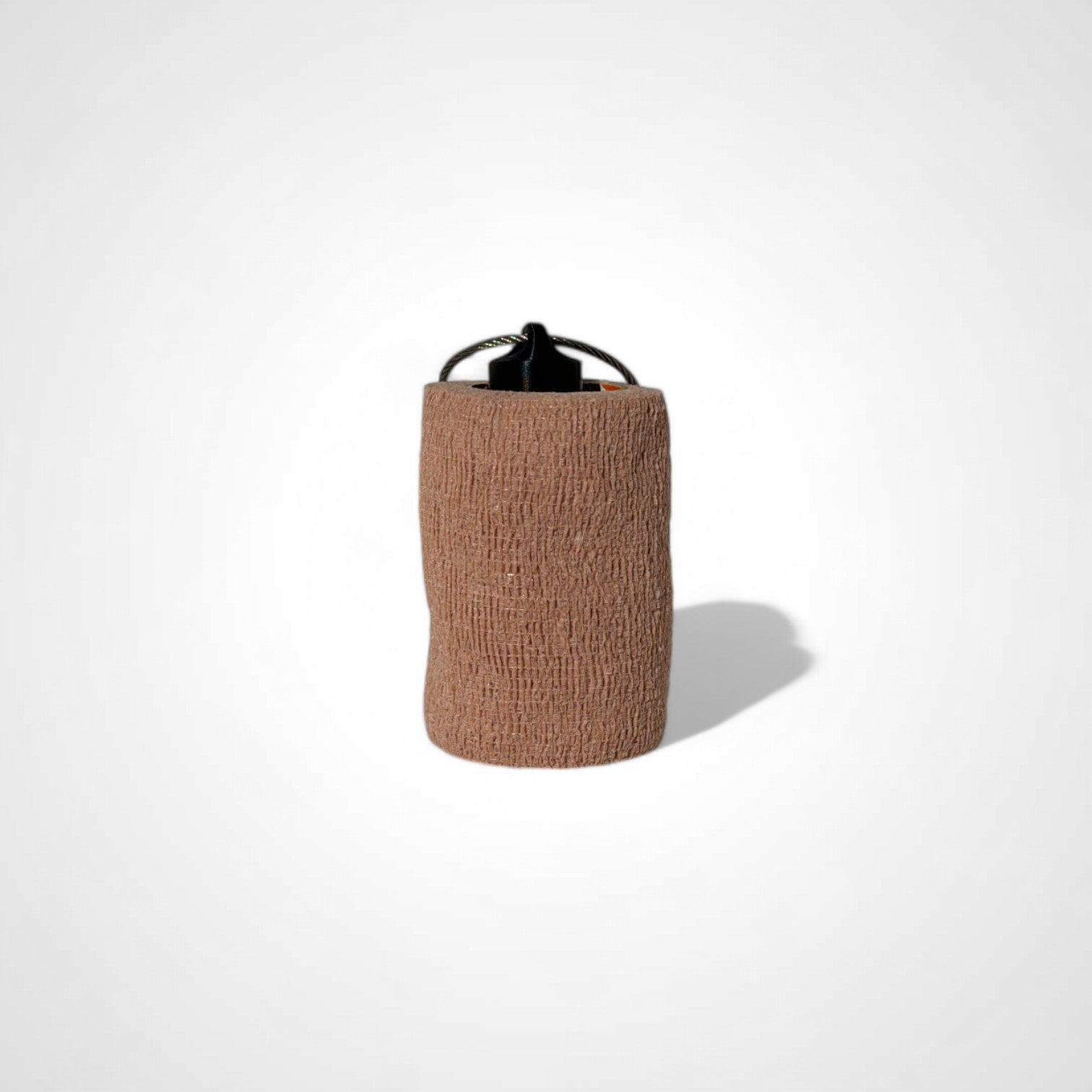 a compact black roll holder 3 inches tall to hold and tape and coban for EMS, paramedics, EMT's, nurses, flightmed, vetmed, and athletic trainers