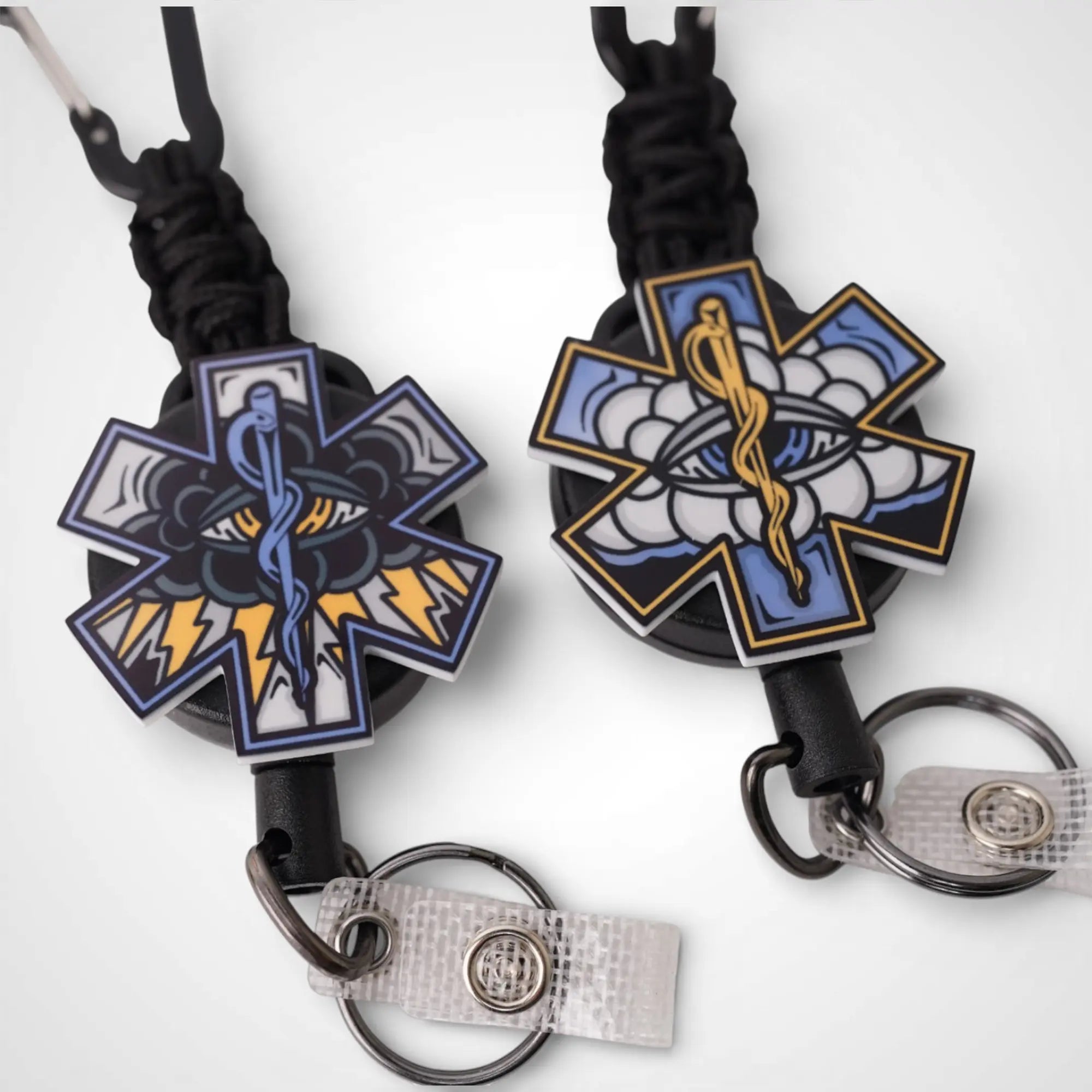 Black and white cloud badge reel partner set. On a carabiner with a steel retractable cable. Shown on a white background.