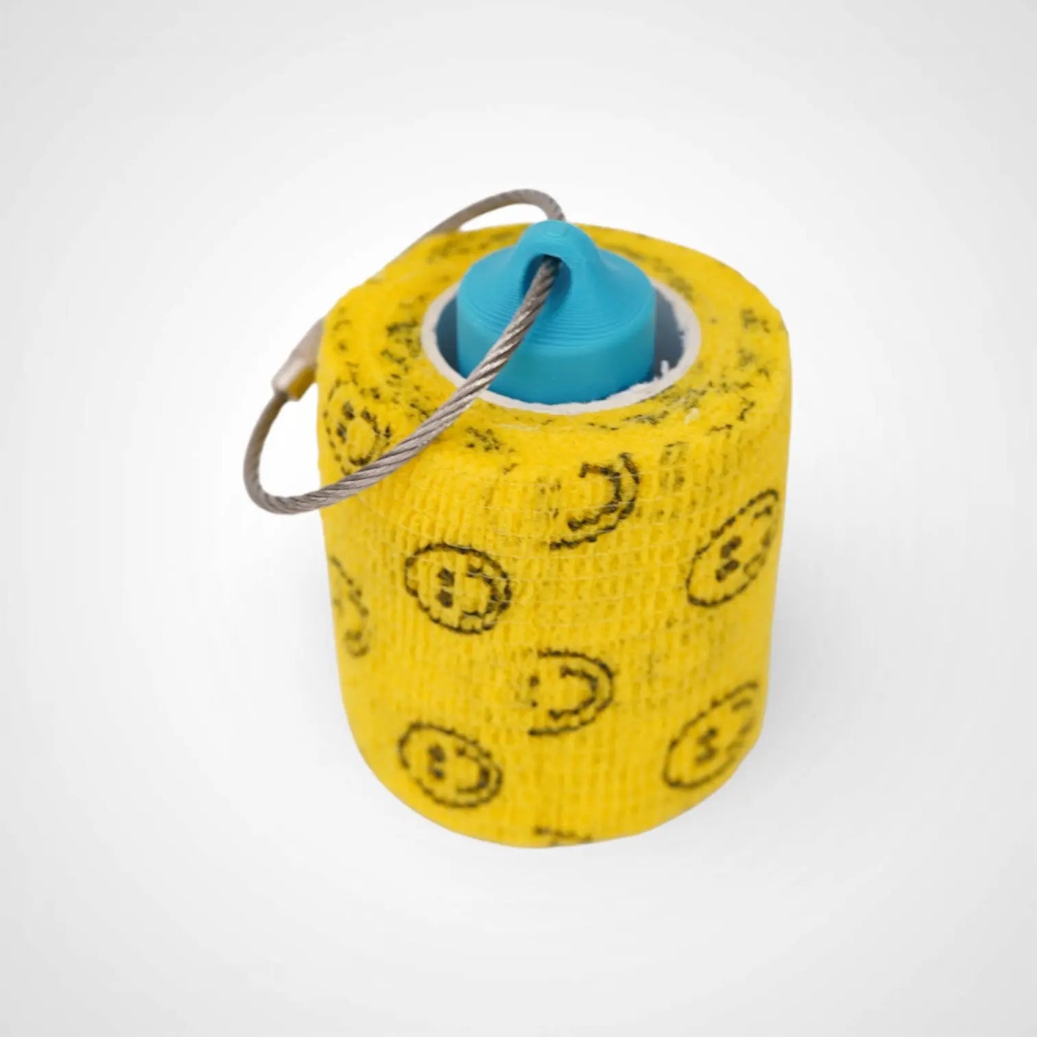 a compact utility keychain called a blue roll holder 2 inches tall to hold and tape transpore tape cohesive bandage coban and bangade rolls for EMS, paramedics, EMT's, nurses, flightmed, vetmed, and athletic trainers