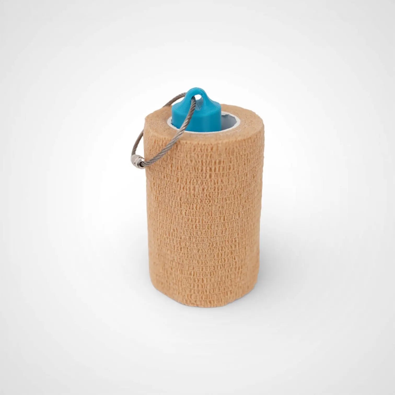 3-inch blue roll holder made with polylactic acid created using additive manufacturing for holding tape and bandage rolls. With a steel cable keyring. Shown with tape on white background.
3-inch tall