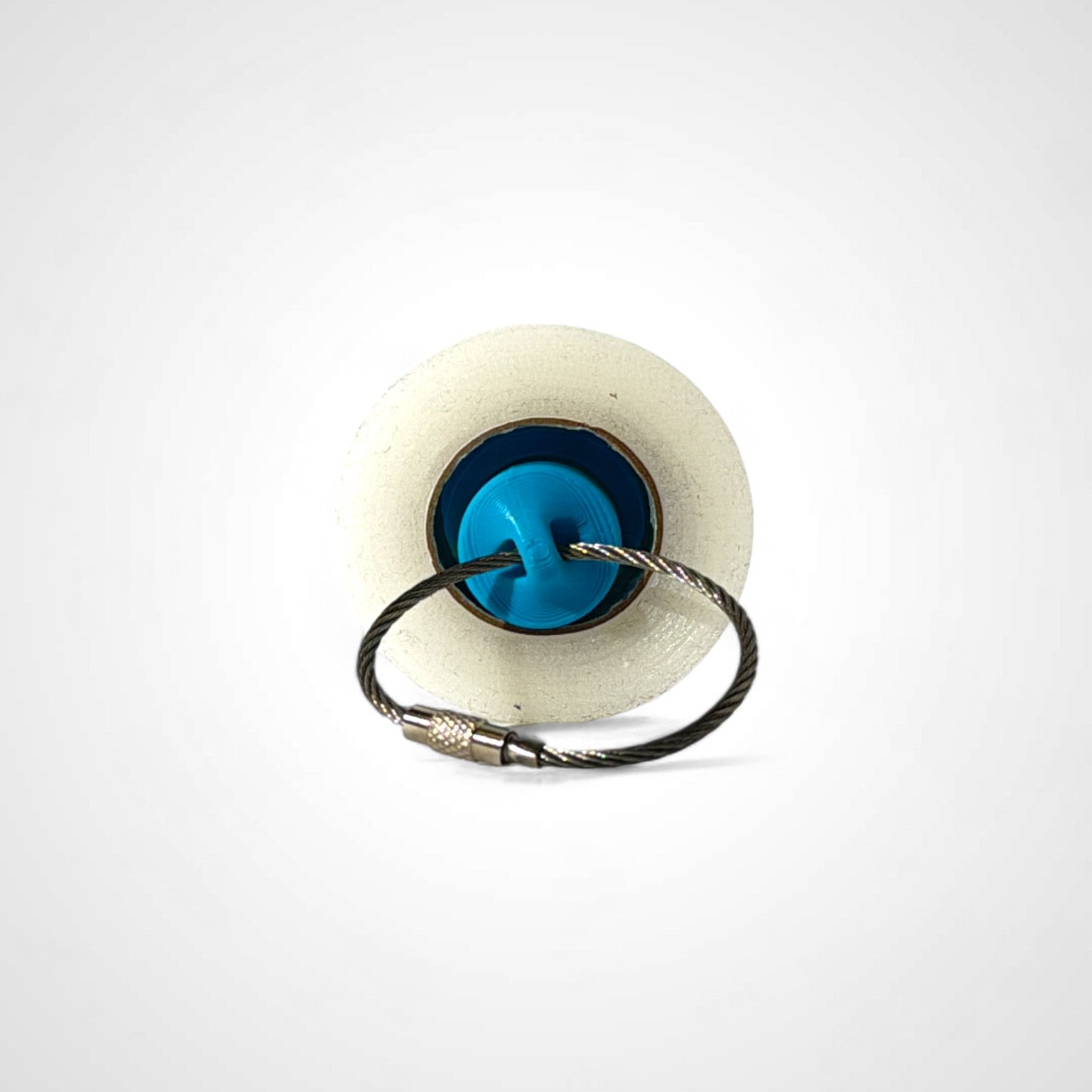 a compact blue roll holder 1 inch tall to hold and tape and coban for EMS, paramedics, EMT's, nurses, flightmed, vetmed, and athletic trainers