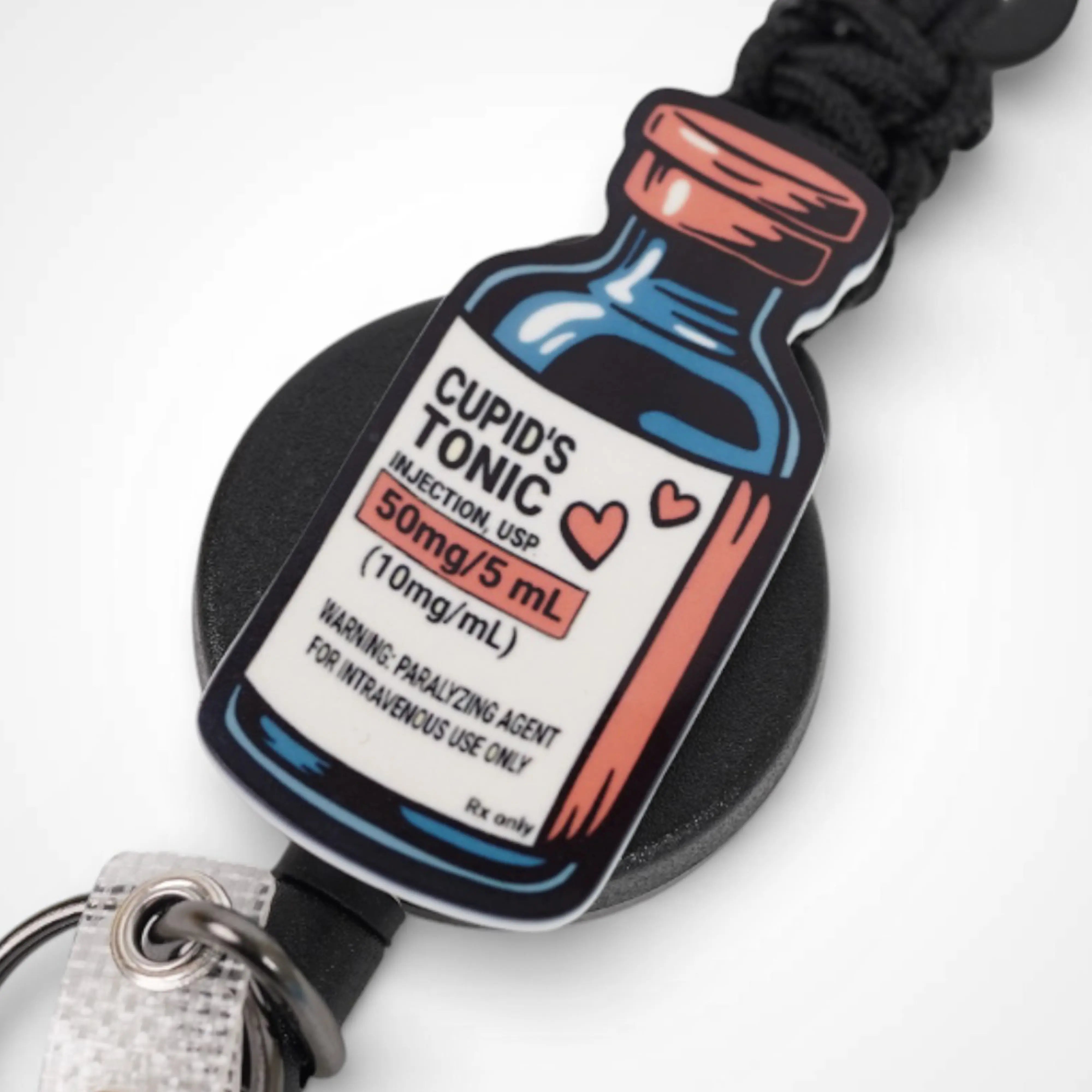 Cupid's Tonic Badge Reel - Rescue Candy