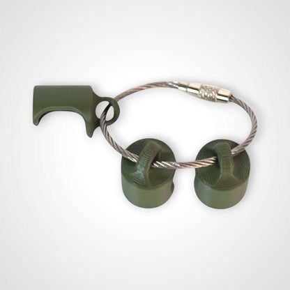 Three army green polylactic acid created using additive manufacturing classic cap clips on steel cable keyring. Shown on a white background.