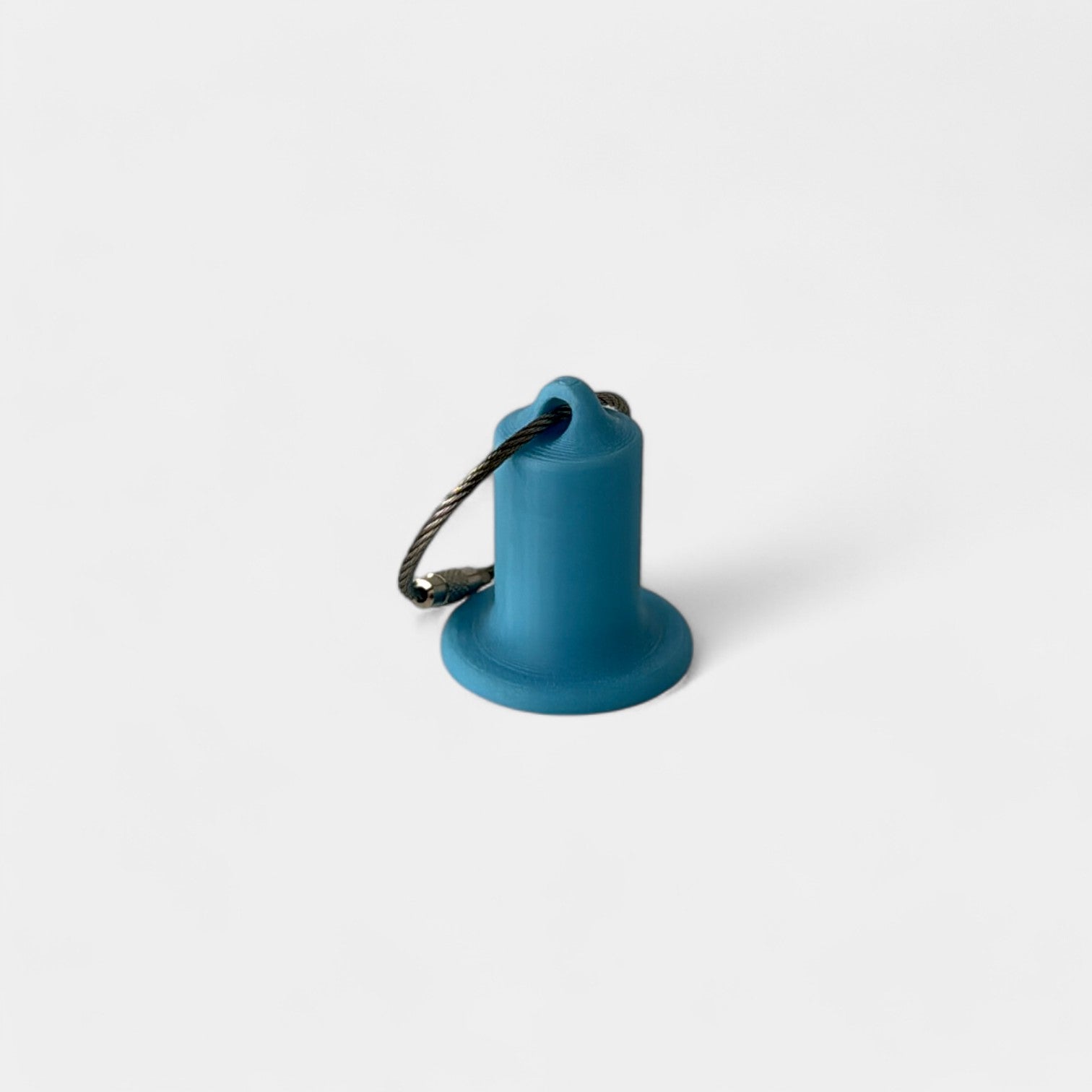 a compact blue glow teal roll holder 1 inch tall to hold and tape and coban for EMS, paramedics, EMT's, nurses, flightmed, vetmed, and athletic trainers
