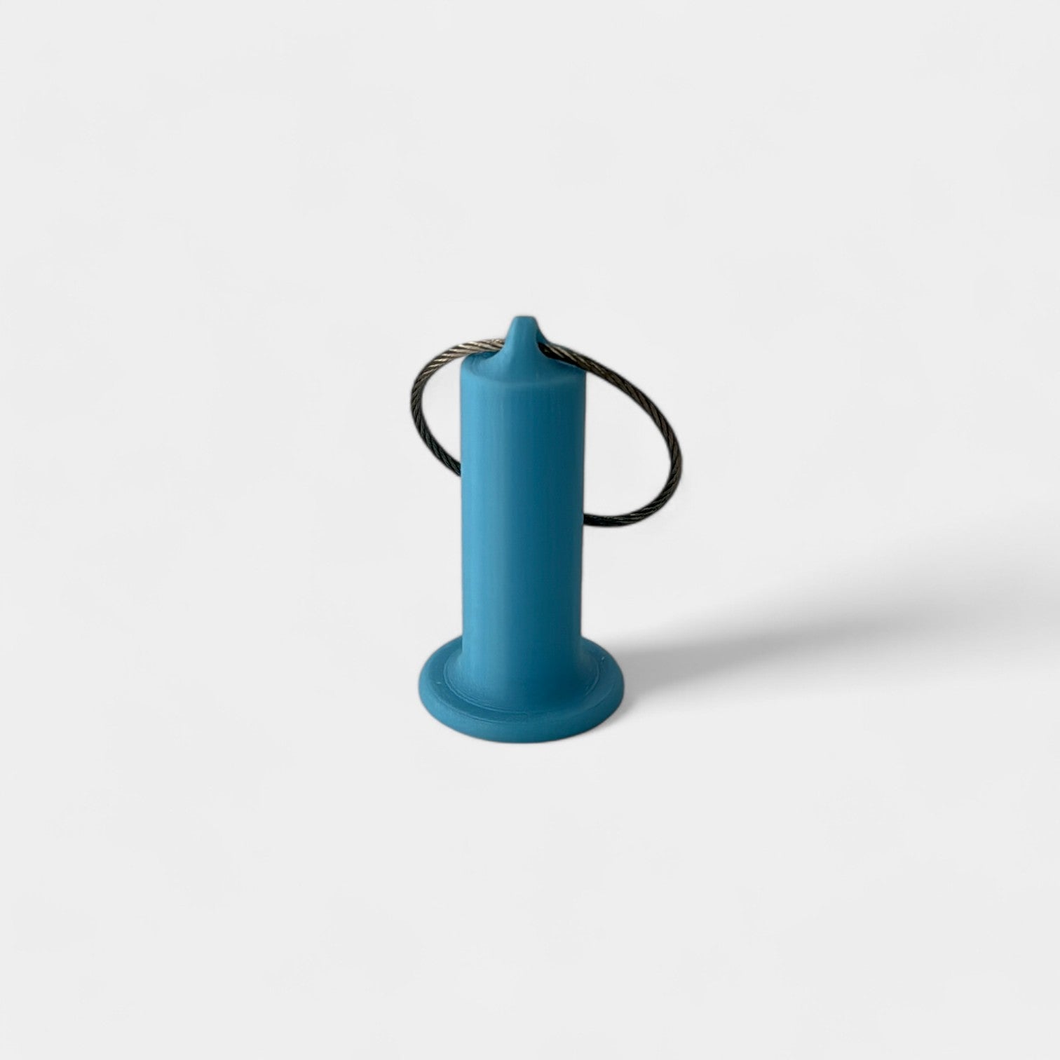 a compact blue glow teal roll holder 2 inches tall to hold and tape and coban for EMS, paramedics, EMT's, nurses, flightmed, vetmed, and athletic trainers