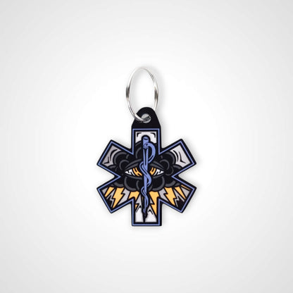 Black Cloud cast acrylic keychain with double coil keyring. Shown on white background.