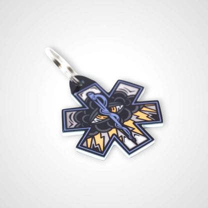 Black Cloud cast acrylic keychain with double coil keyring. Shown on white background.