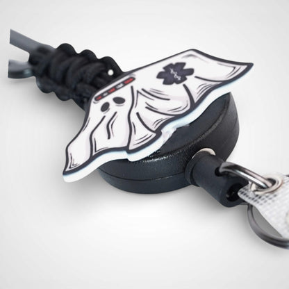 Ghost ambulance badge reel. On a carabiner with steel retractable cable. Shown on a white background.