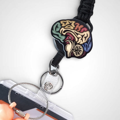 Sagittal brain badge reel. On a carabiner with a steel retractable cable. Shown on a white background.
