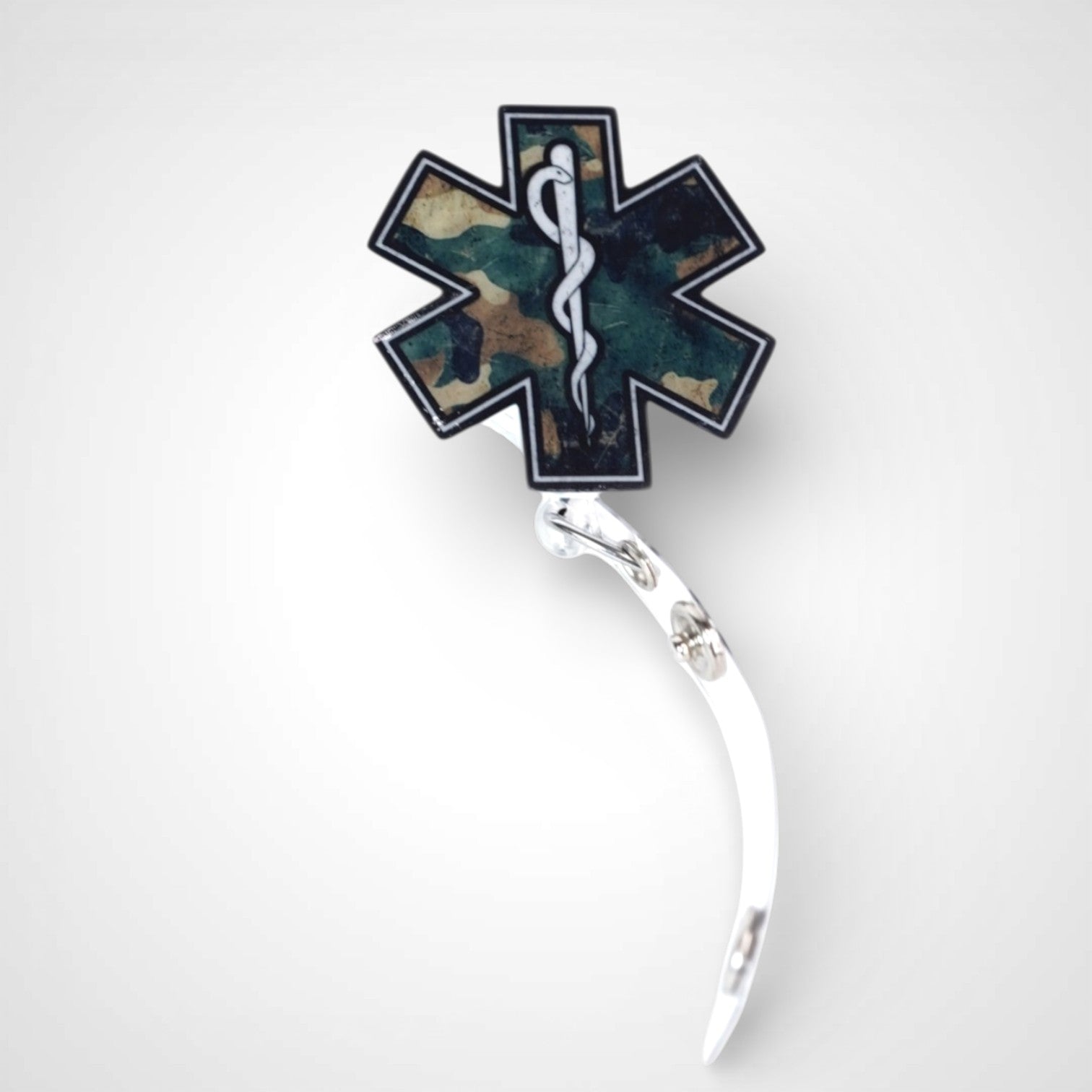 Camo Star badge reel. On a swivel-alligator clip that rotates 360° with a nylon retractable string. Shown on a white background.