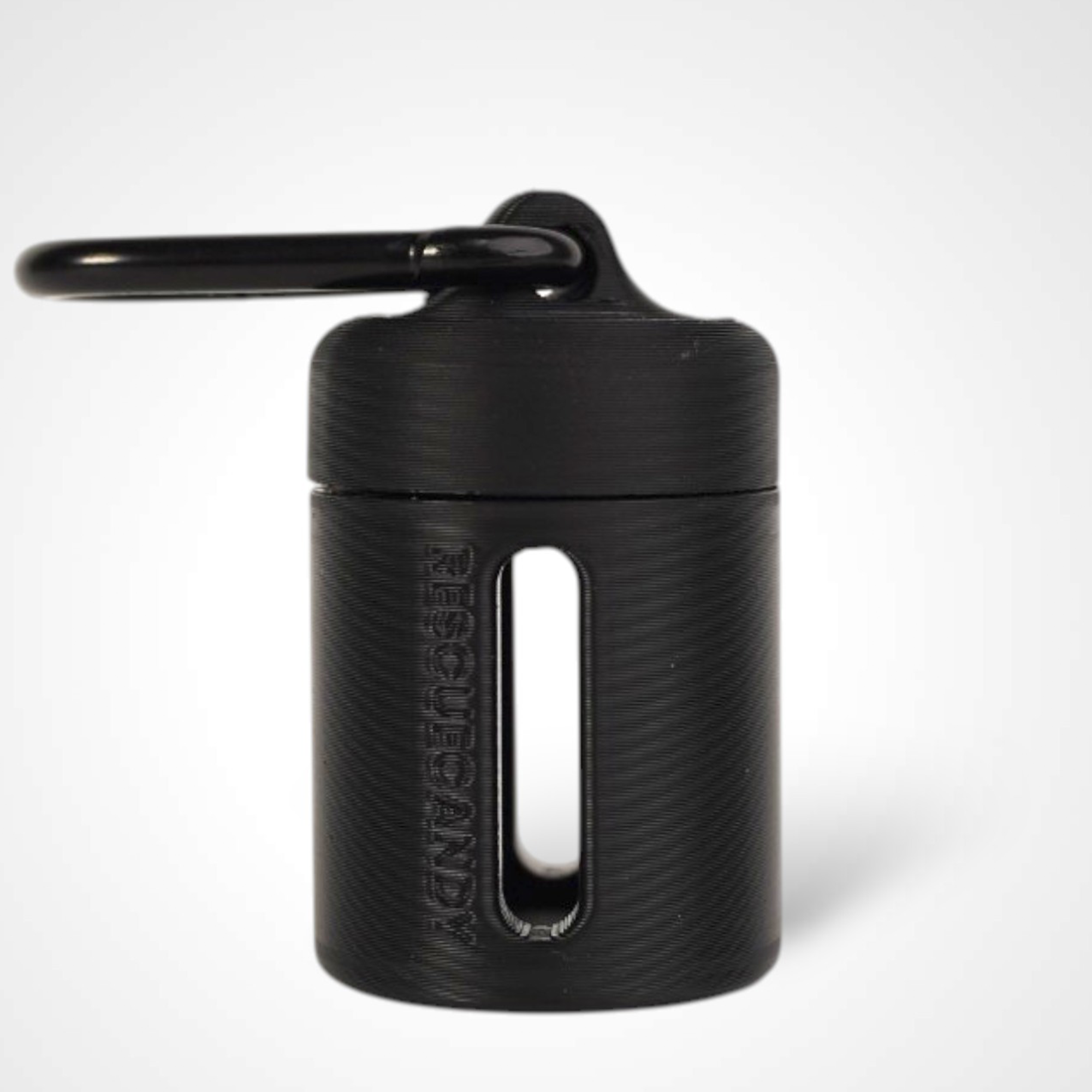 Black vial vault. For empty 2ml or smaller vials, made with polylactic acid created using additive manufacturing. With 1.37" stainless steel black coated carabiner. Shown on white background.