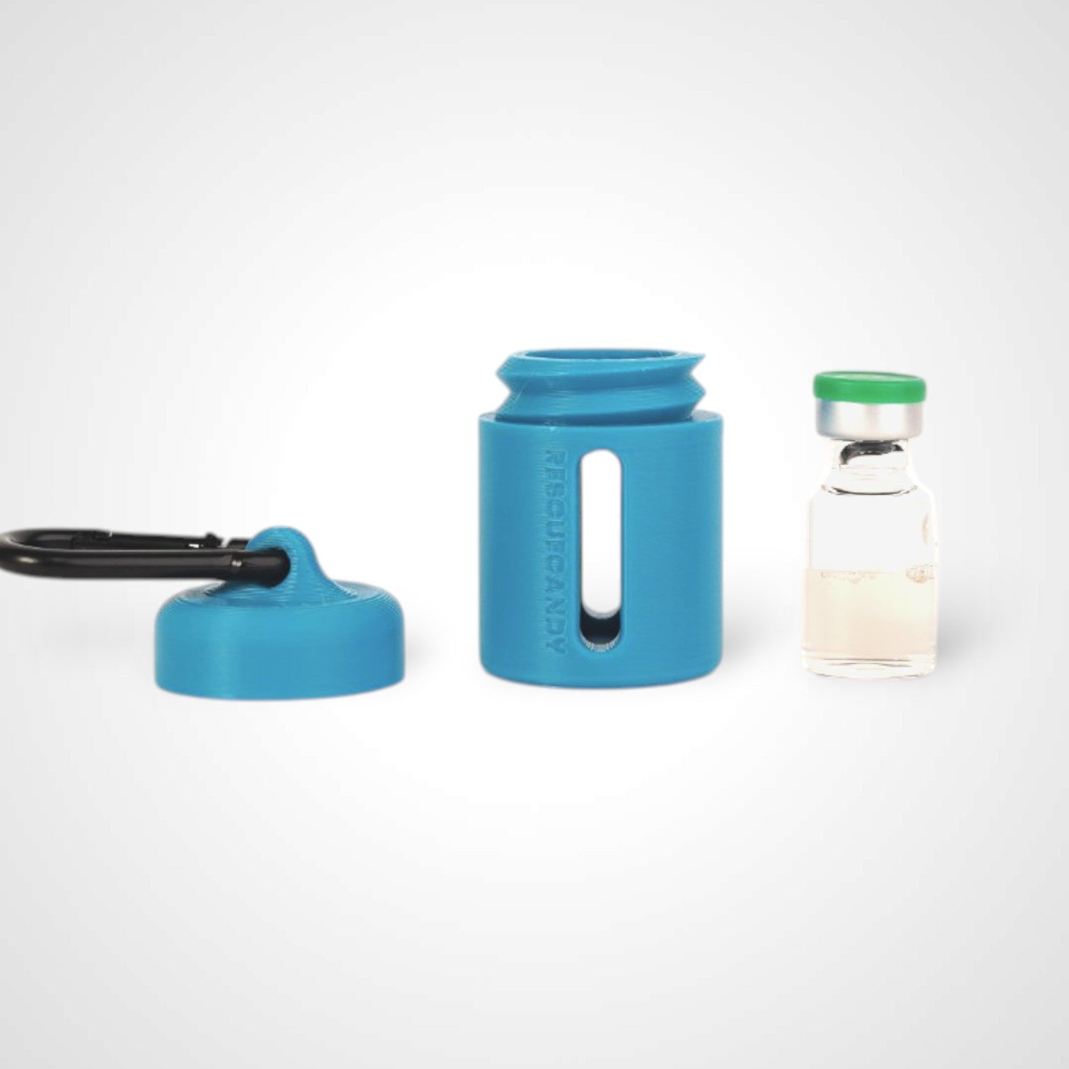 Blue vial vault. For empty 2ml or smaller vials, made with polylactic acid created using additive manufacturing. With 1.37" stainless steel black coated carabiner. Shown next to vial on white background.