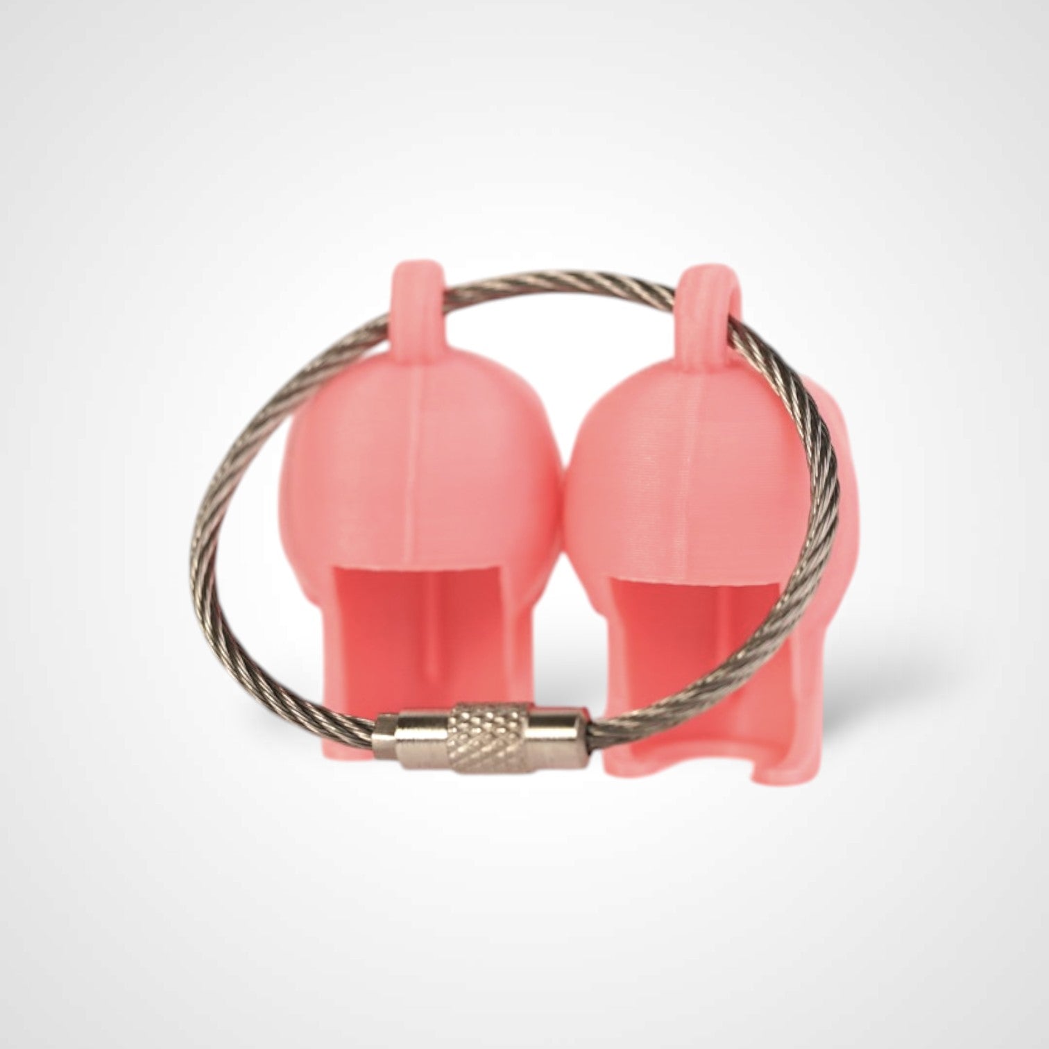 Two pink polylactic acid created using additive manufacturing skull cap clips on steel cable keyring. Shown on a white background.