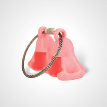 Two pink polylactic acid created using additive manufacturing ghost cap clips on steel cable keyring. Shown on a white background.