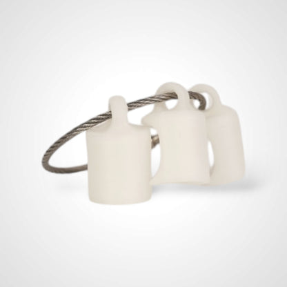 Three white polylactic acid created using additive manufacturing classic cap clips on steel cable keyring. Shown on a white background.