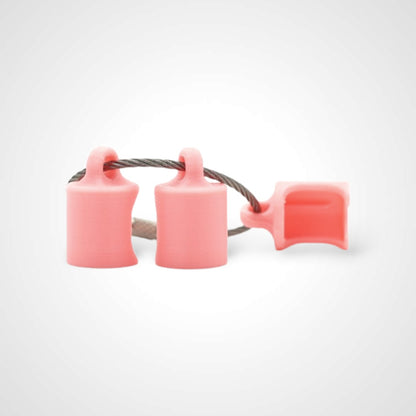 Three pink polylactic acid created using additive manufacturing classic cap clips on steel cable keyring. Shown on a white background.