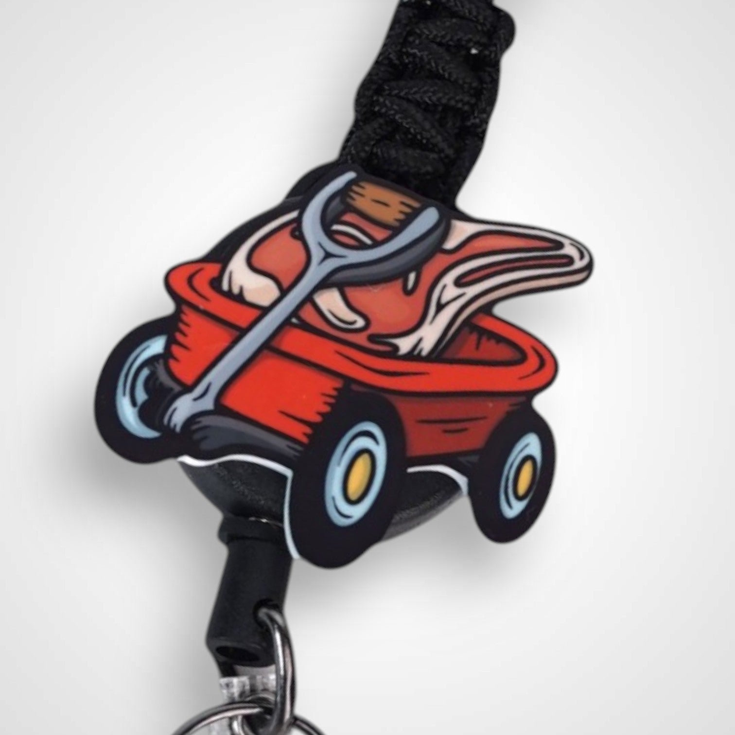 Meat wagon badge reel. On a carabiner with a steel retractable cable. Shown on a white background.