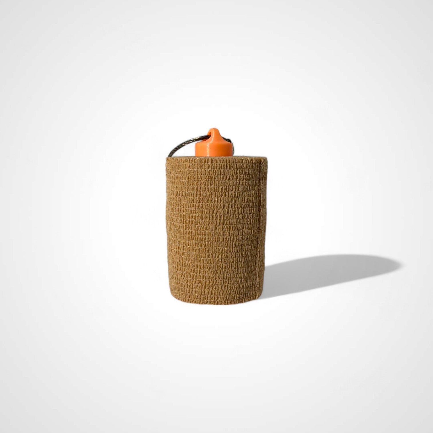 a compact orange glow yellow roll holder 3 inches tall to hold and tape and coban for EMS, paramedics, EMT's, nurses, flightmed, vetmed, and athletic trainers