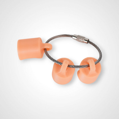 Three orange polylactic acid created using additive manufacturing classic cap clips on steel cable keyring. Shown on a white background.