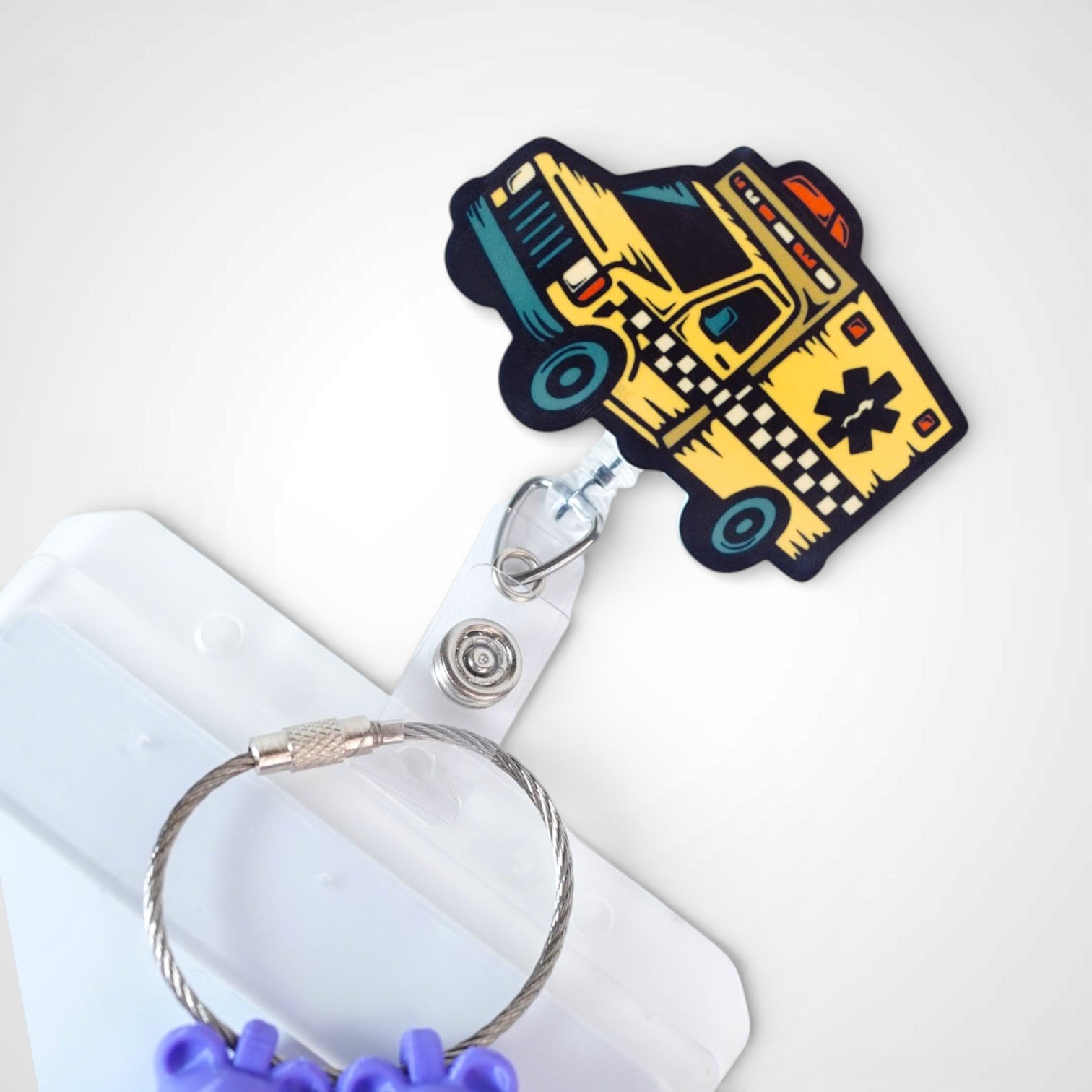 Taxi badge reel. On a swivel-alligator clip that rotates 360° with a nylon retractable string. Shown on a white background.