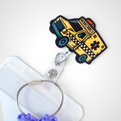 Taxi badge reel. On a swivel-alligator clip that rotates 360° with a nylon retractable string. Shown on a white background.